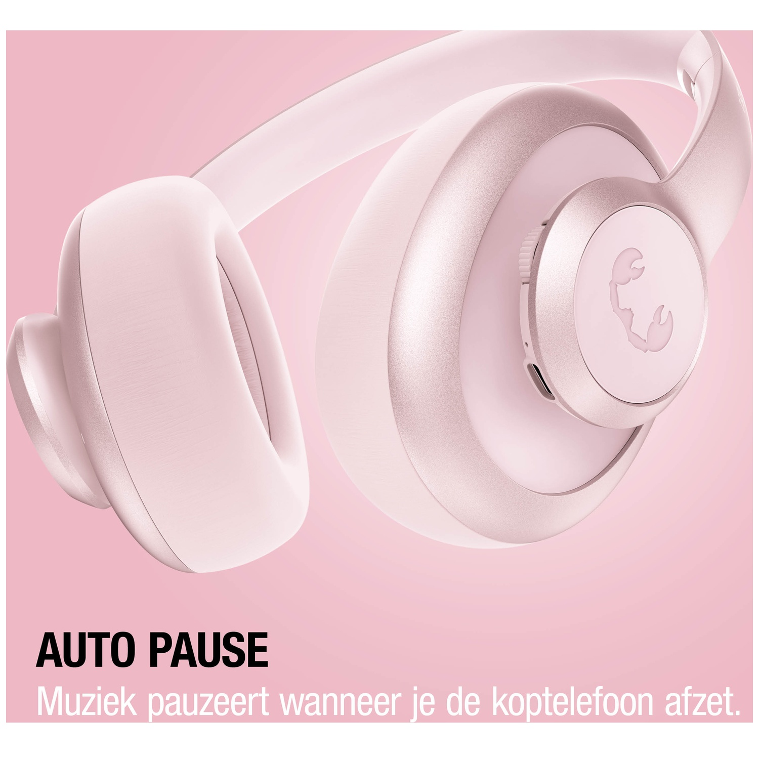 Pink headphones with a scorpion logo on a pink background.