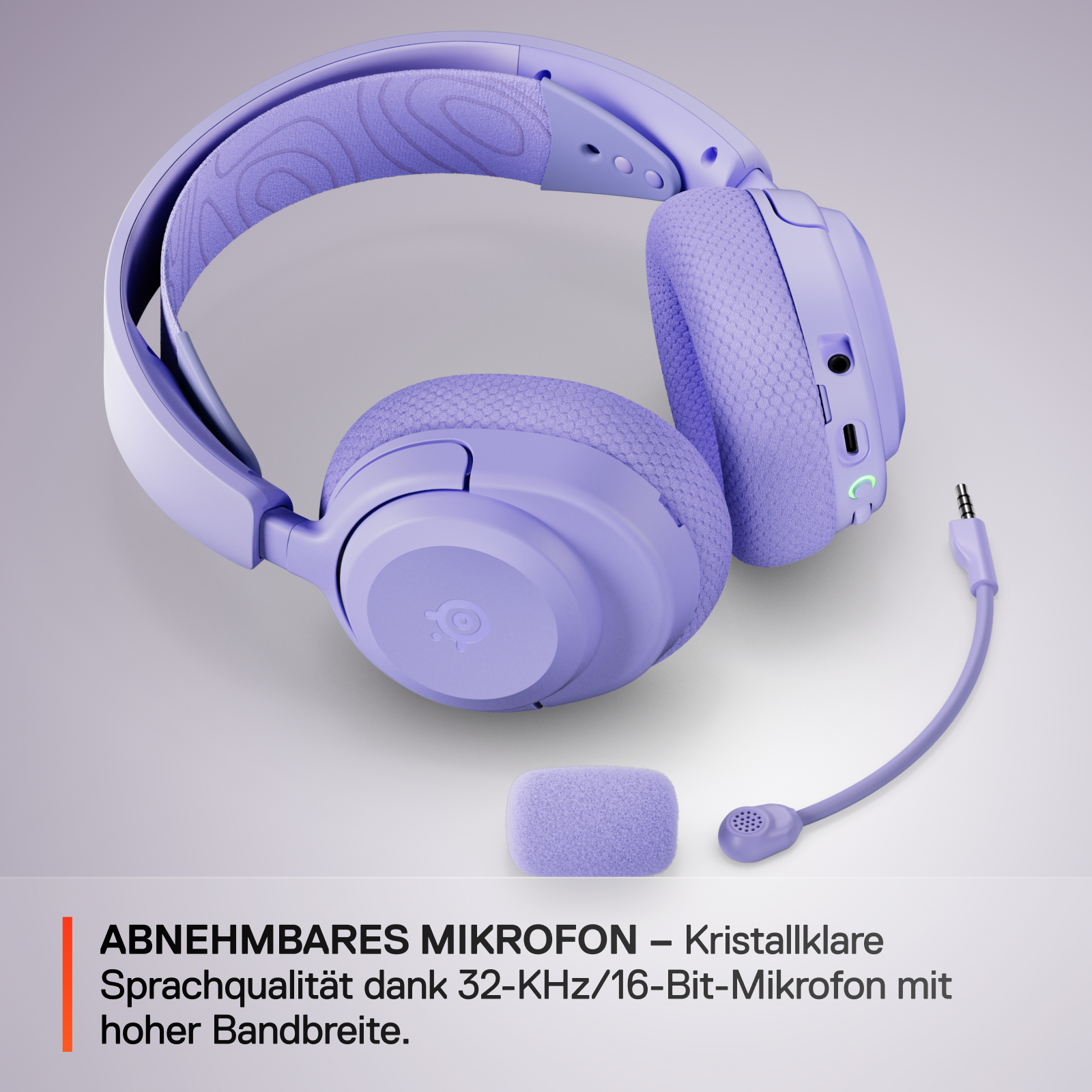 Lila Kopfhörer mit abnehmbarem Mikrofon und Kopfband mit Muster.