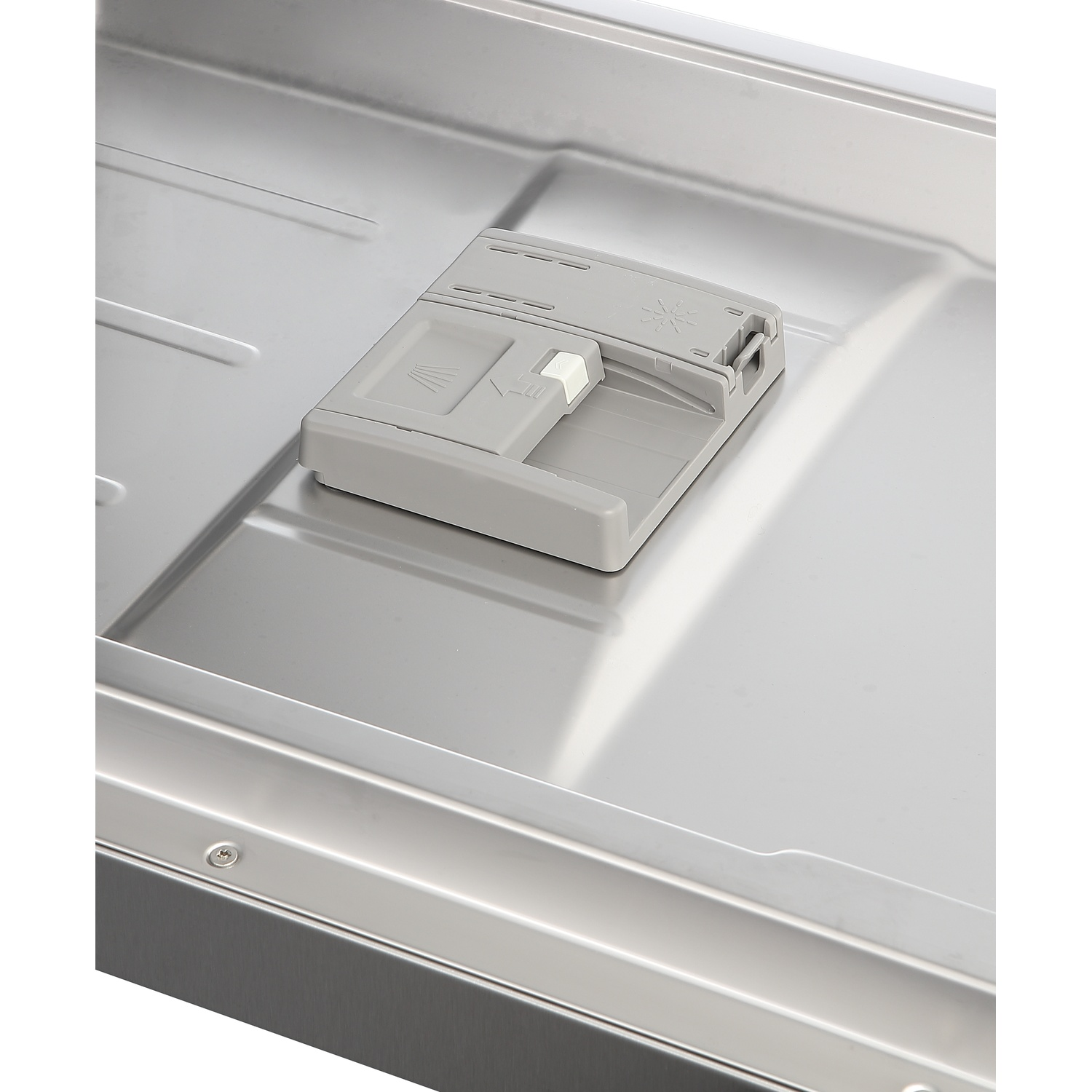 A gray detergent dispenser sits inside the metal basin of a dishwasher.