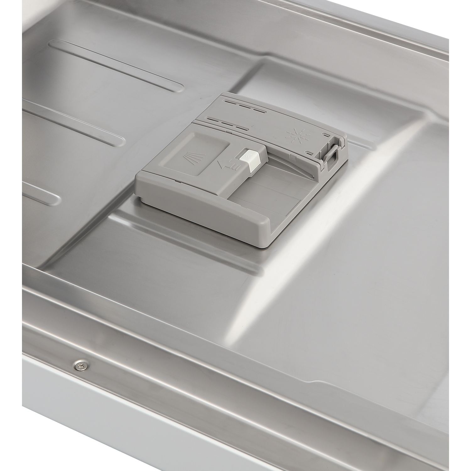 Close-up of a dishwasher interior with a gray detergent dispenser.