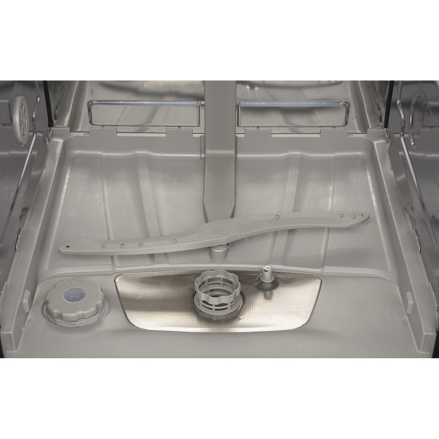 Interior view of a dishwasher with spray arm, salt dispenser, and filter.