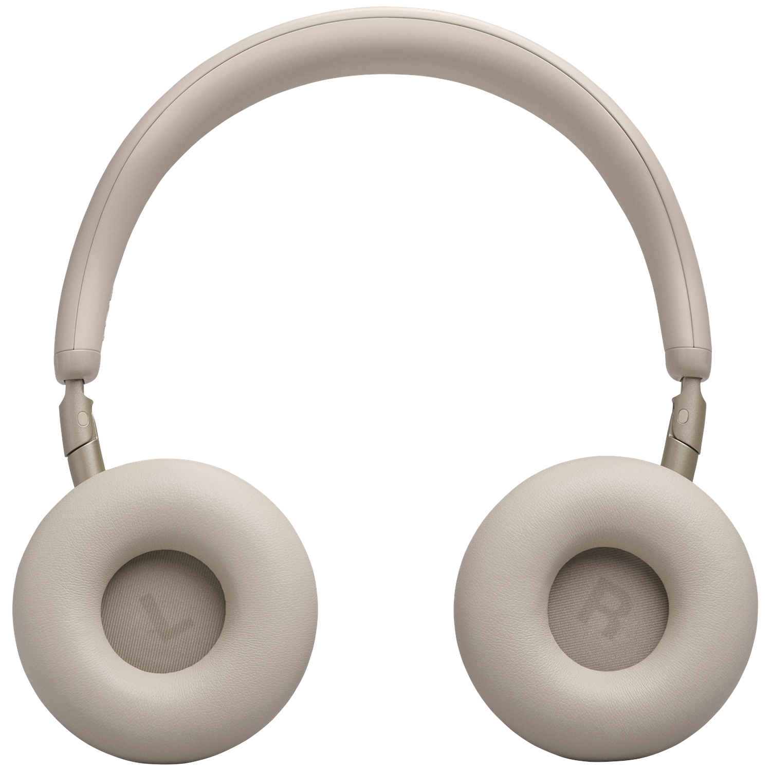 Light beige, cushioned over-ear headphones against a black background.