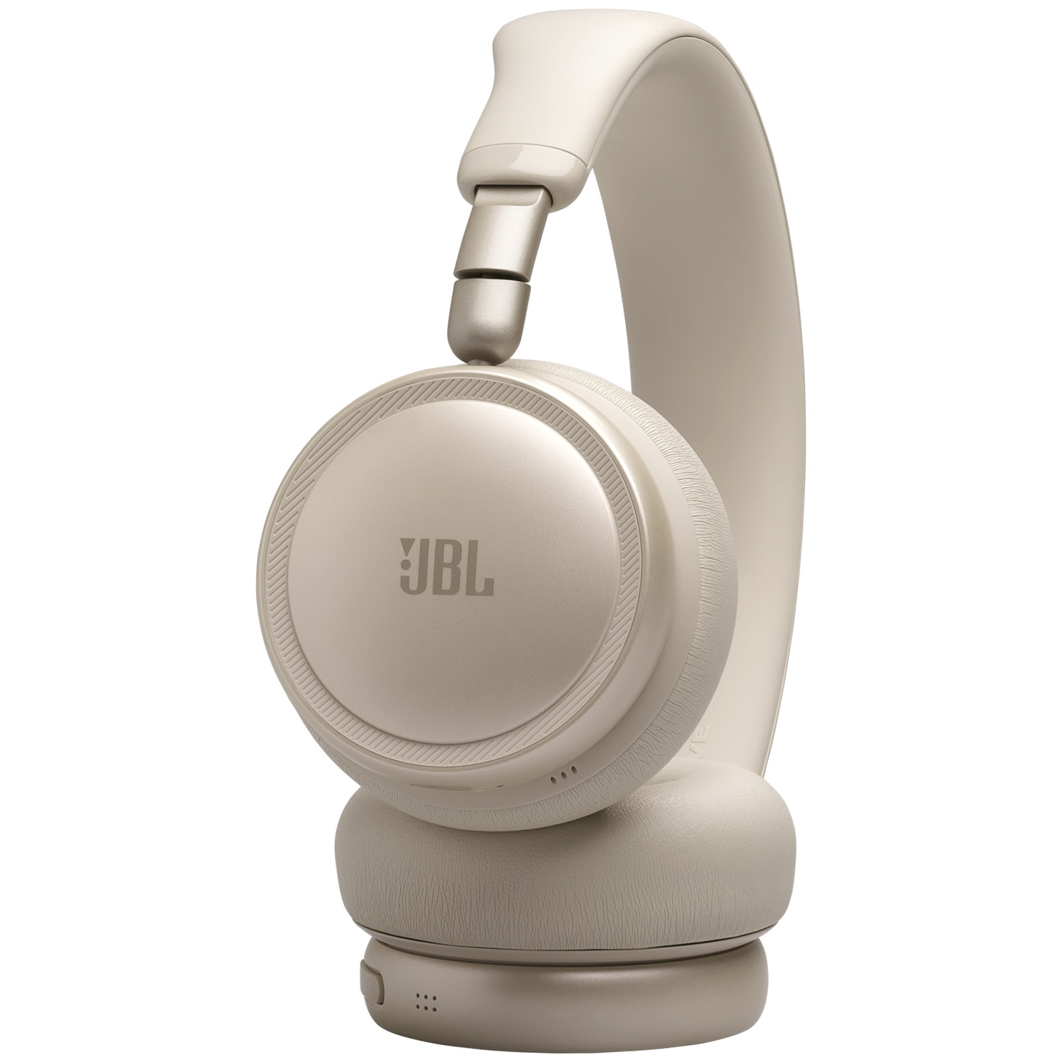 Casque JBL beige clair avec logo JBL argenté sur l'oreillette.