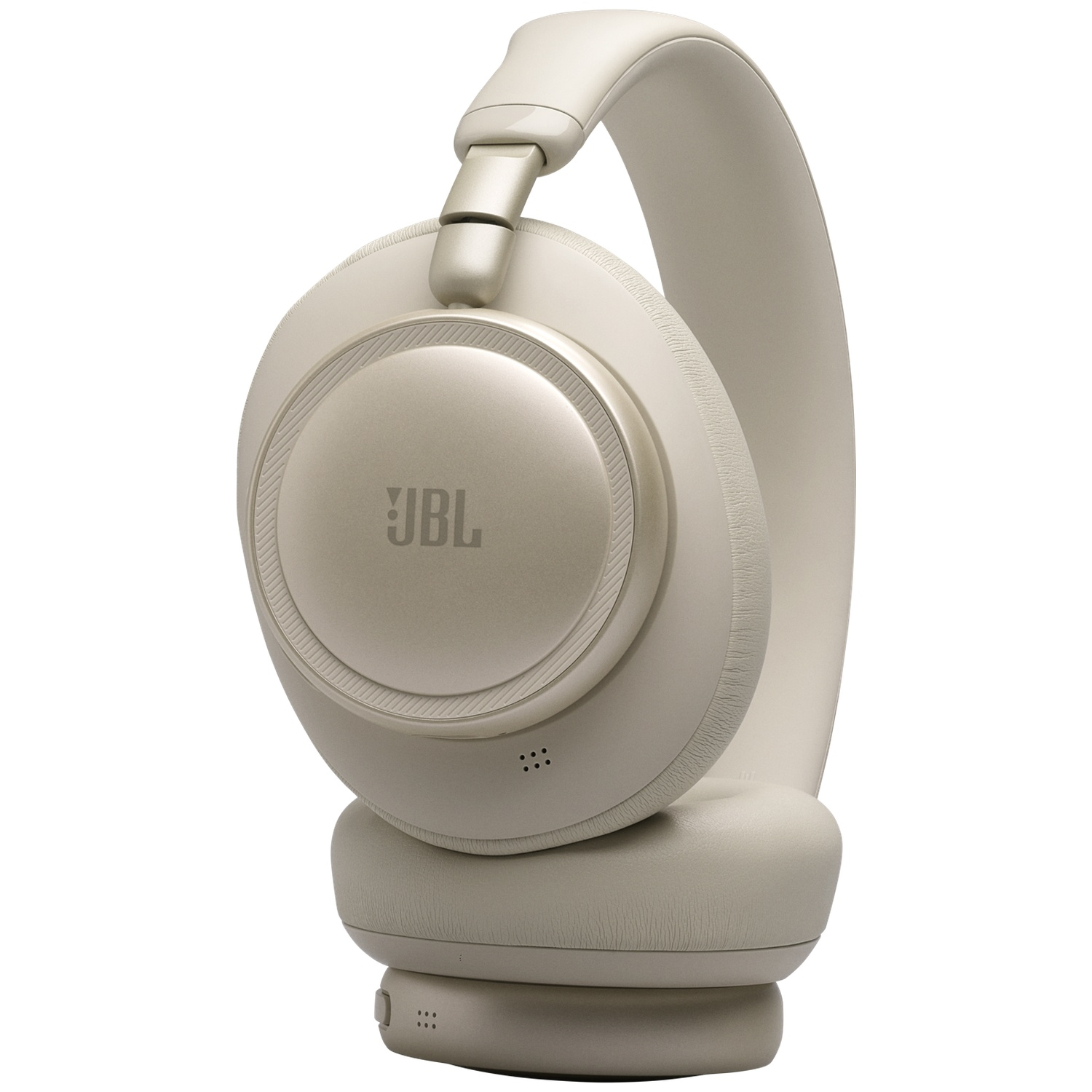 Casque JBL beige avec arceau et écouteurs rembourrés.