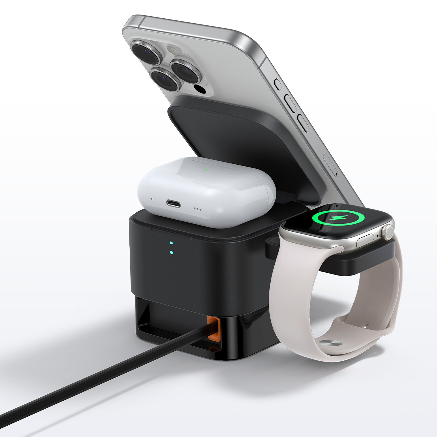 Un soporte de carga negro con un iPhone, estuche de AirPods y Apple Watch.