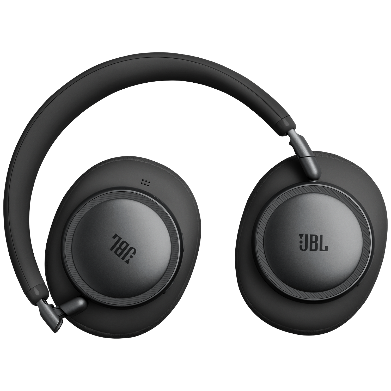 Black JBL headphones with padded earcups, on a black background.