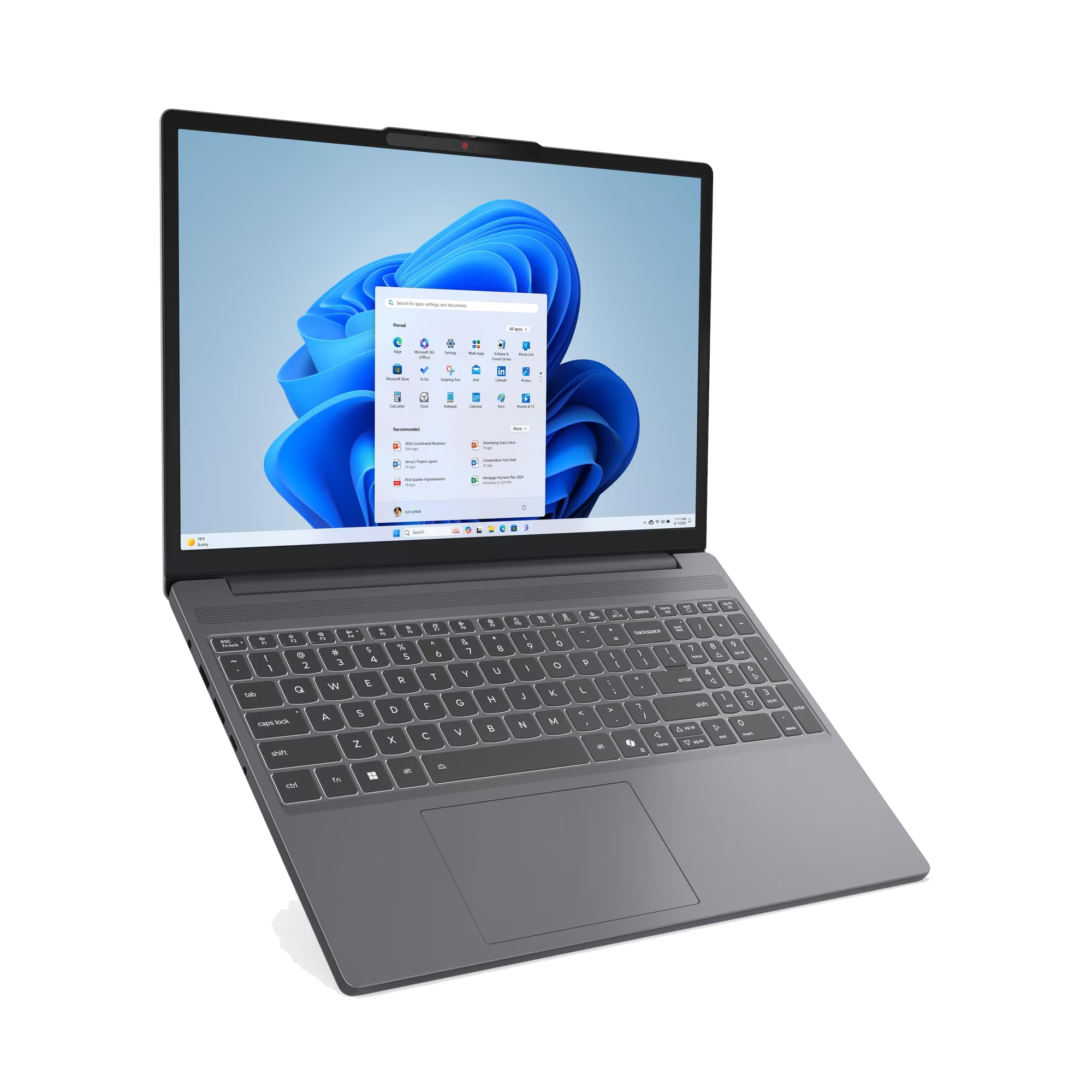 Un portátil oscuro con un menú de inicio de Windows 11 abierto y teclado.