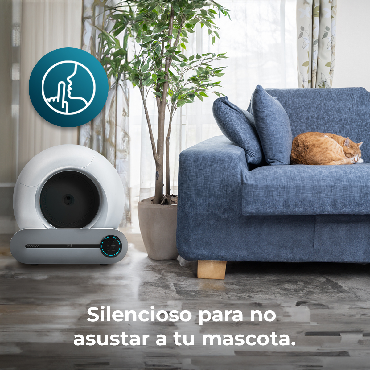 Un purificador de aire moderno junto a un sofá donde duerme un gato.