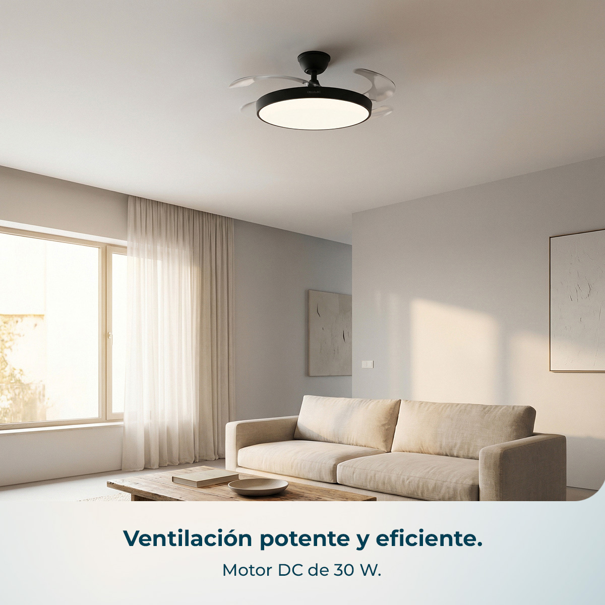 Ventilador de techo moderno con luz sobre un sofá beige en una sala de estar.