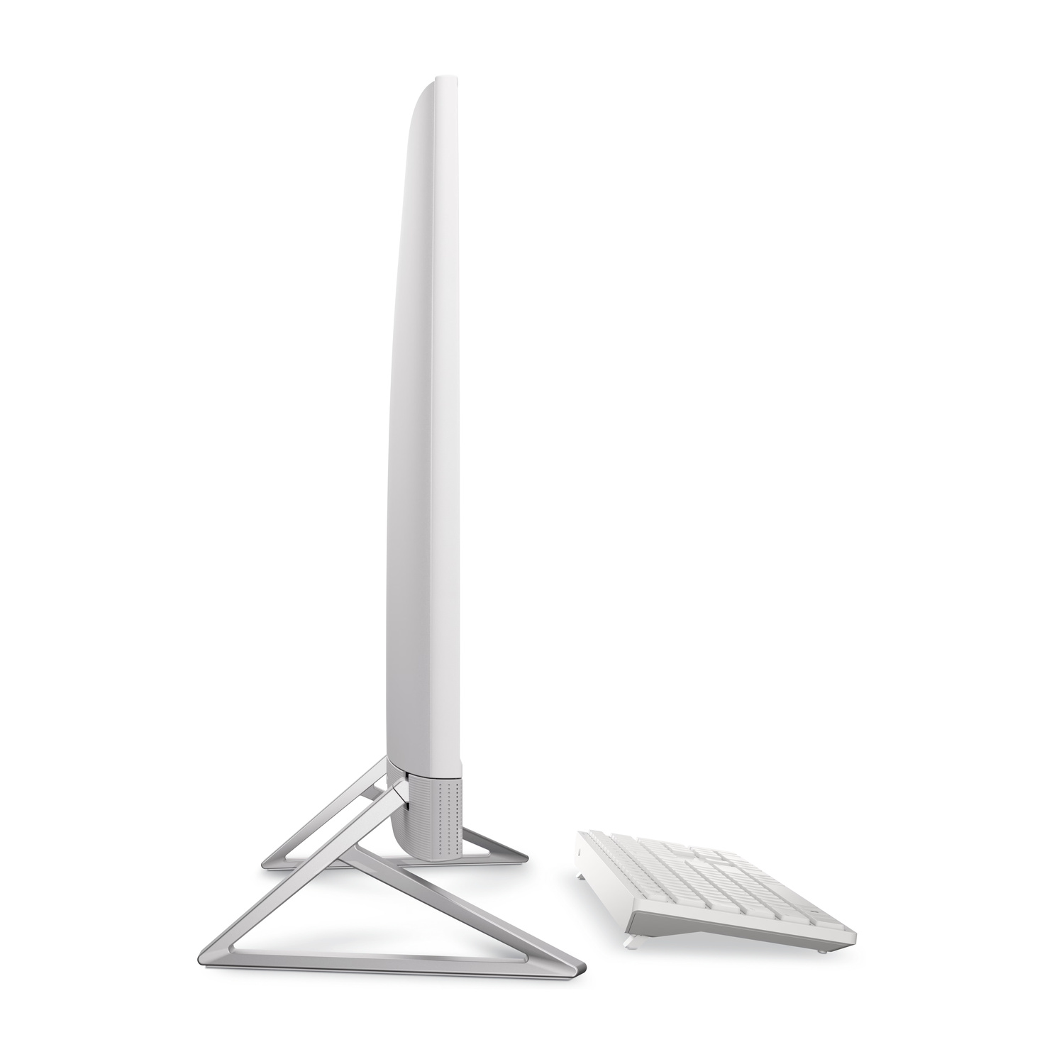 Un elegante monitor di computer all-in-one bianco con supporto e tastiera argentati.