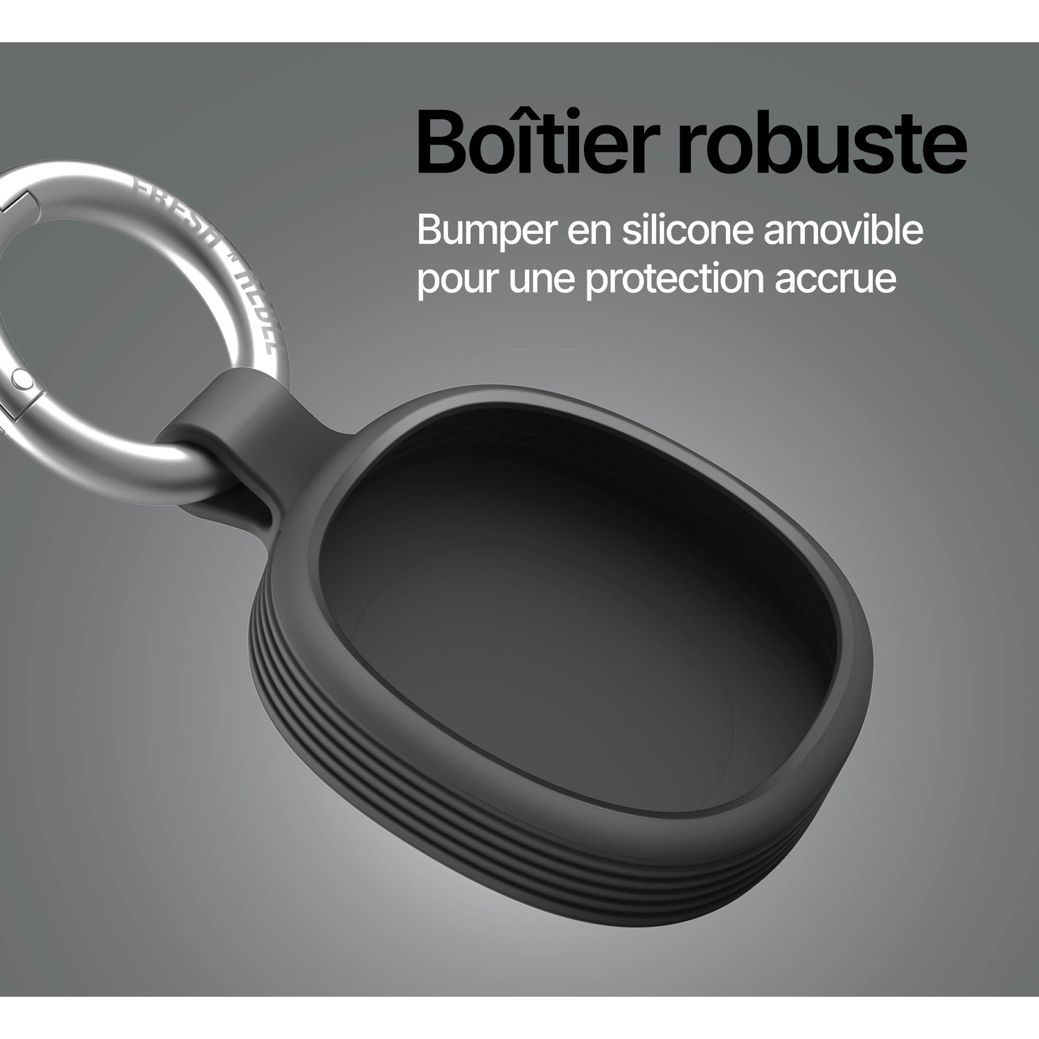 Étui en silicone noir avec porte-clés sur fond gris.
