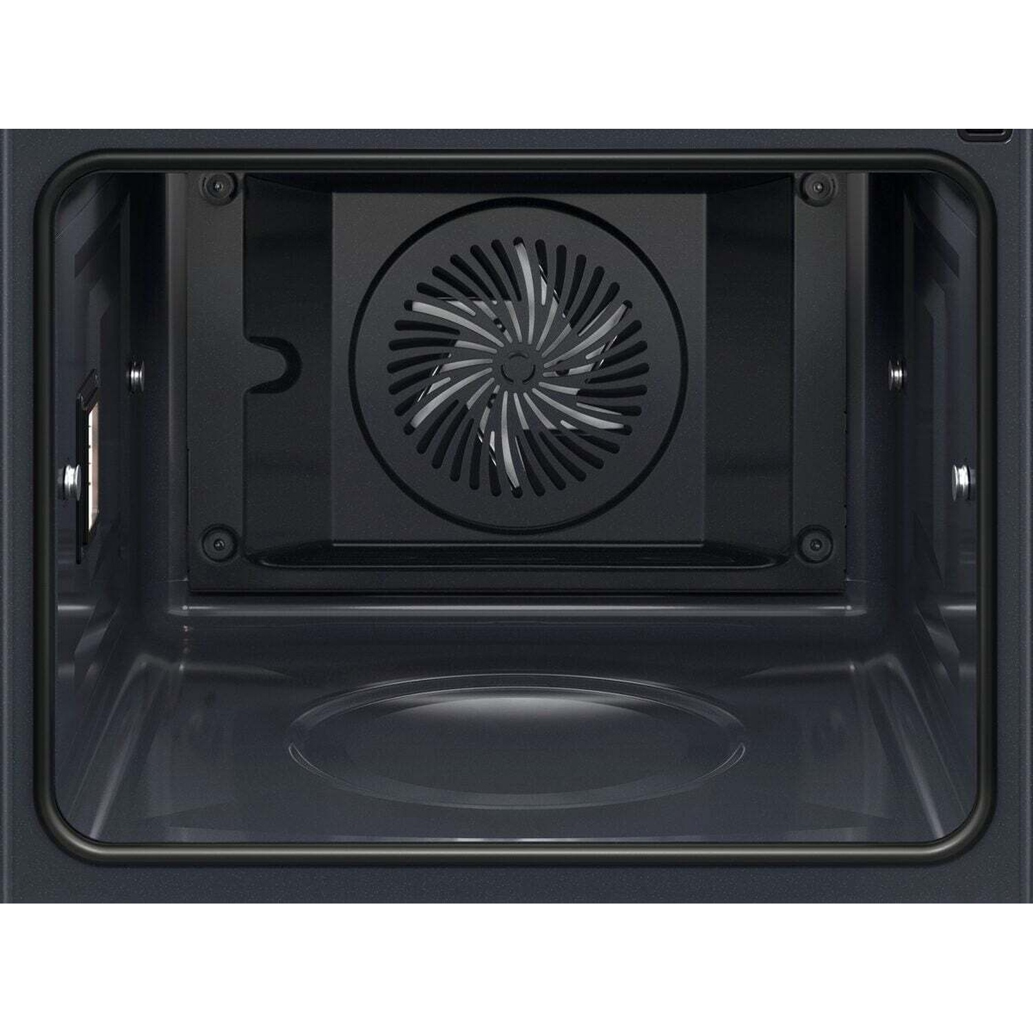 Interno di un forno a microonde con ventola e base girevole.