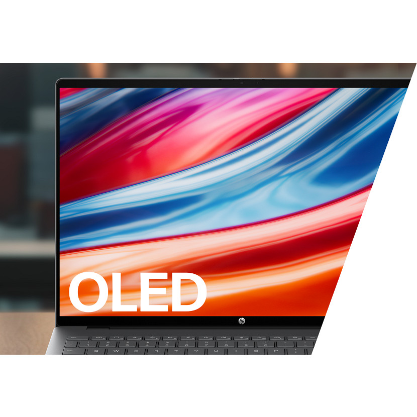 Laptop wyświetlający kolorowy ekran OLED z abstrakcyjnymi falami.