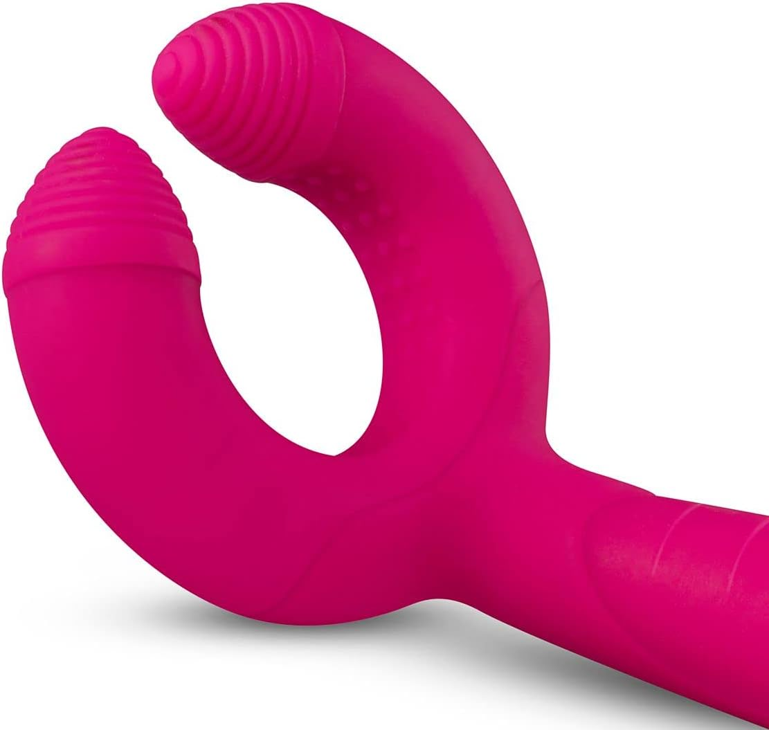 Un vibromasseur rose aux embouts côtelés et à la forme incurvée.