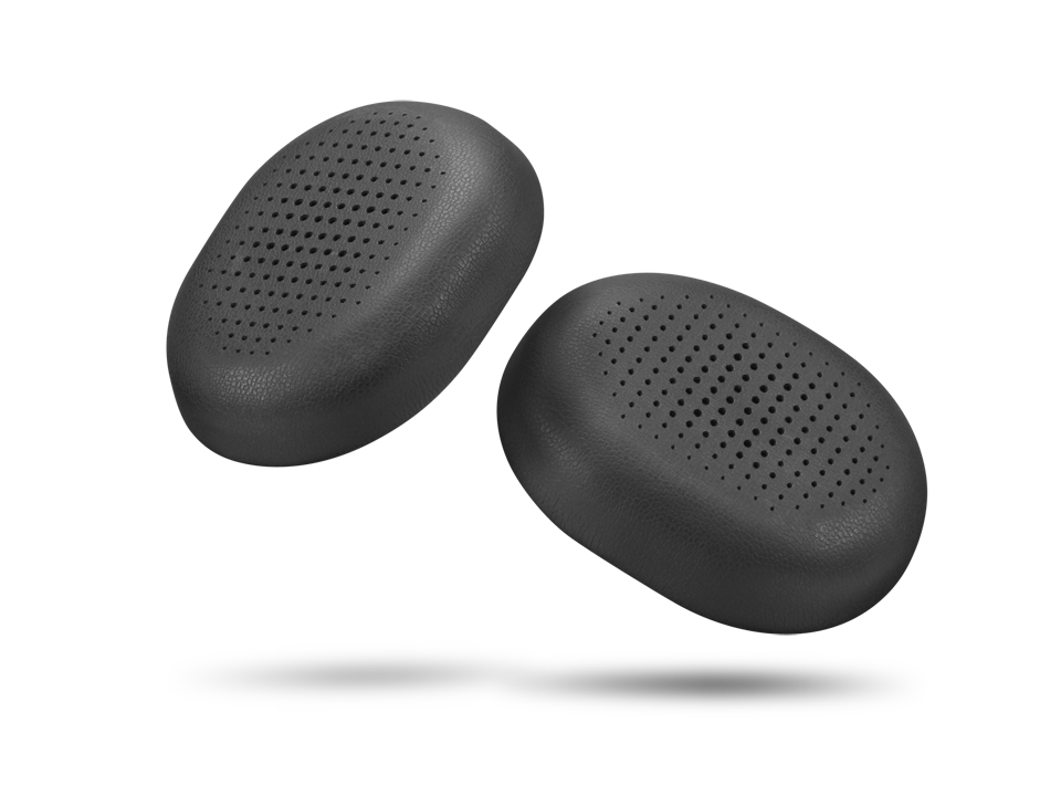 Dos almohadillas negras ovaladas con superficie perforada yacen una al lado de la otra.