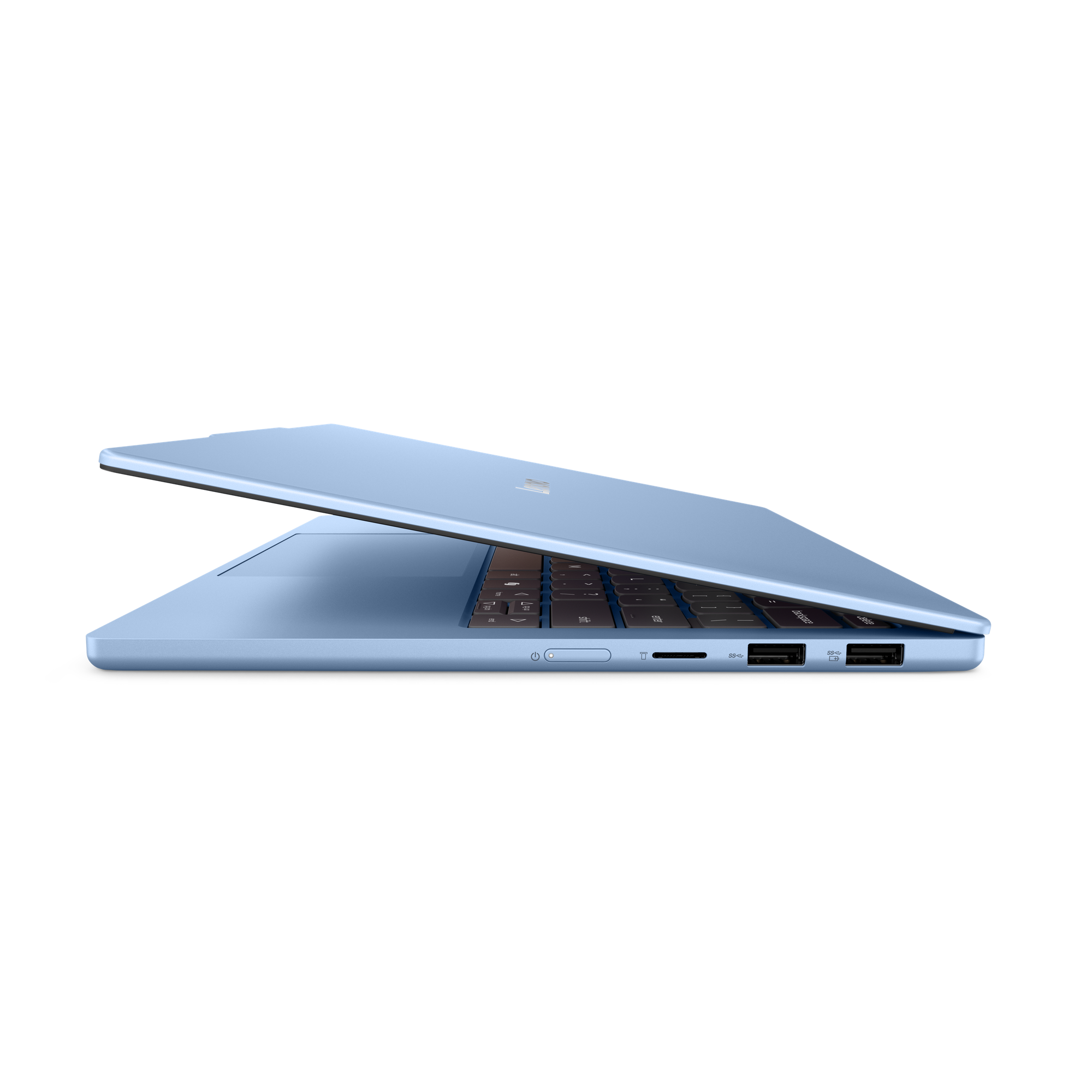 Világoskék laptop nyitva fekete háttéren. A billentyűzet és a portok láthatók.