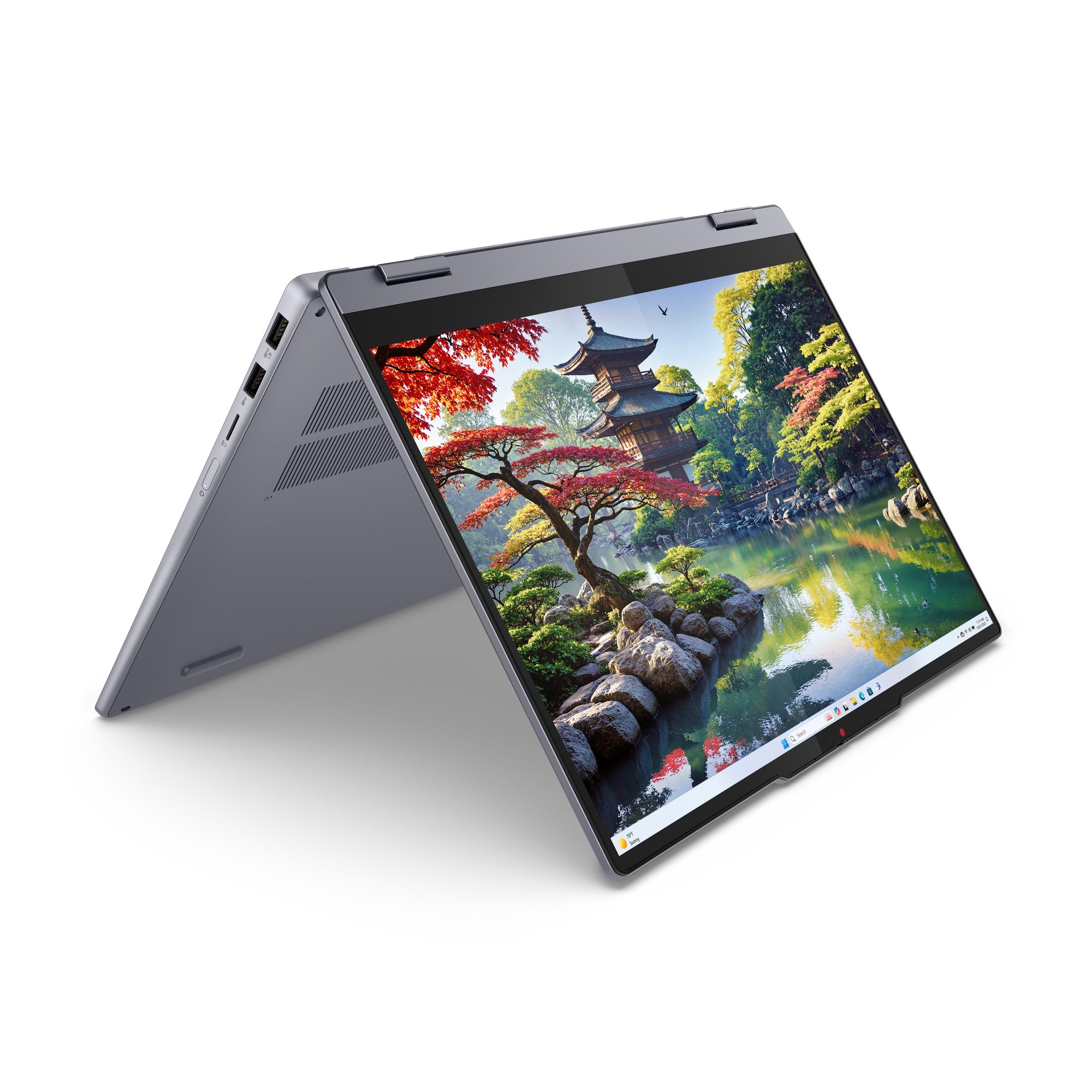 Ezüst laptop jelenít meg egy nyugodt japán kerti jelenetet a képernyőjén.