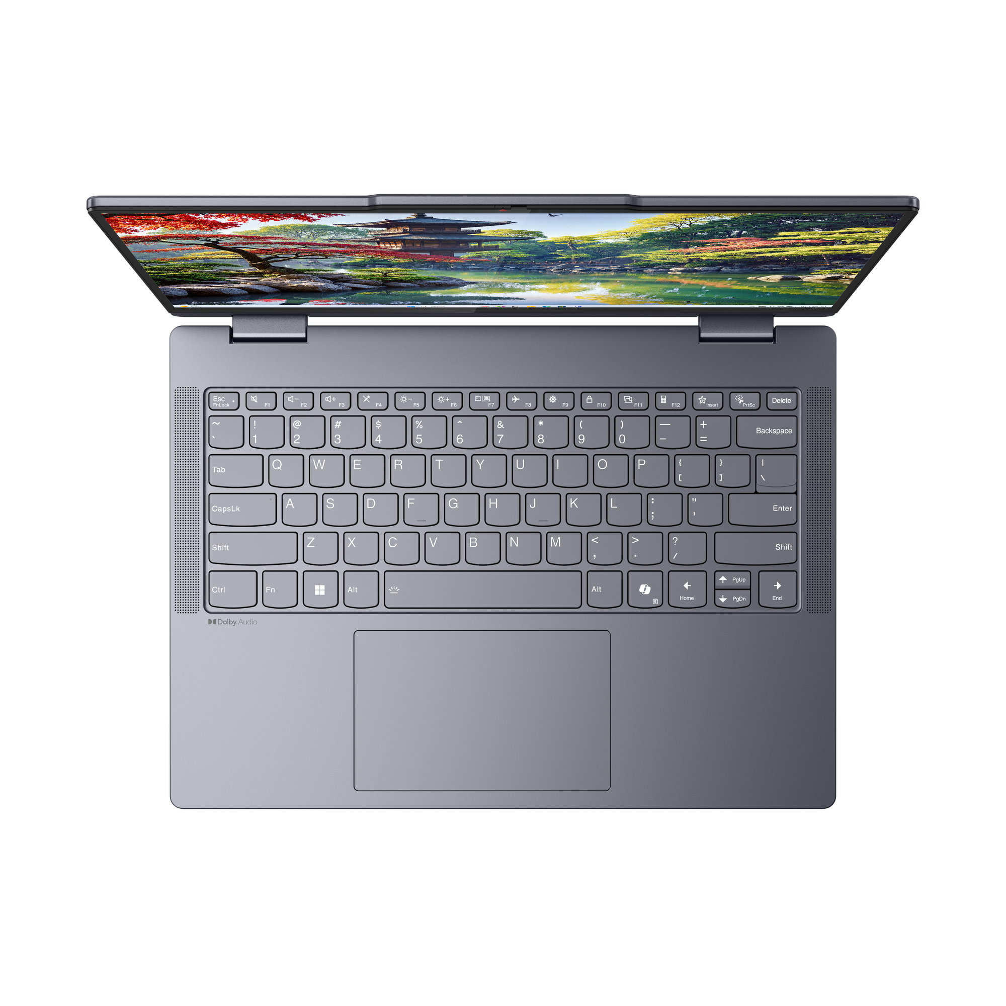 Egy nyitott laptop japán kertet jelenít meg a képernyőjén.