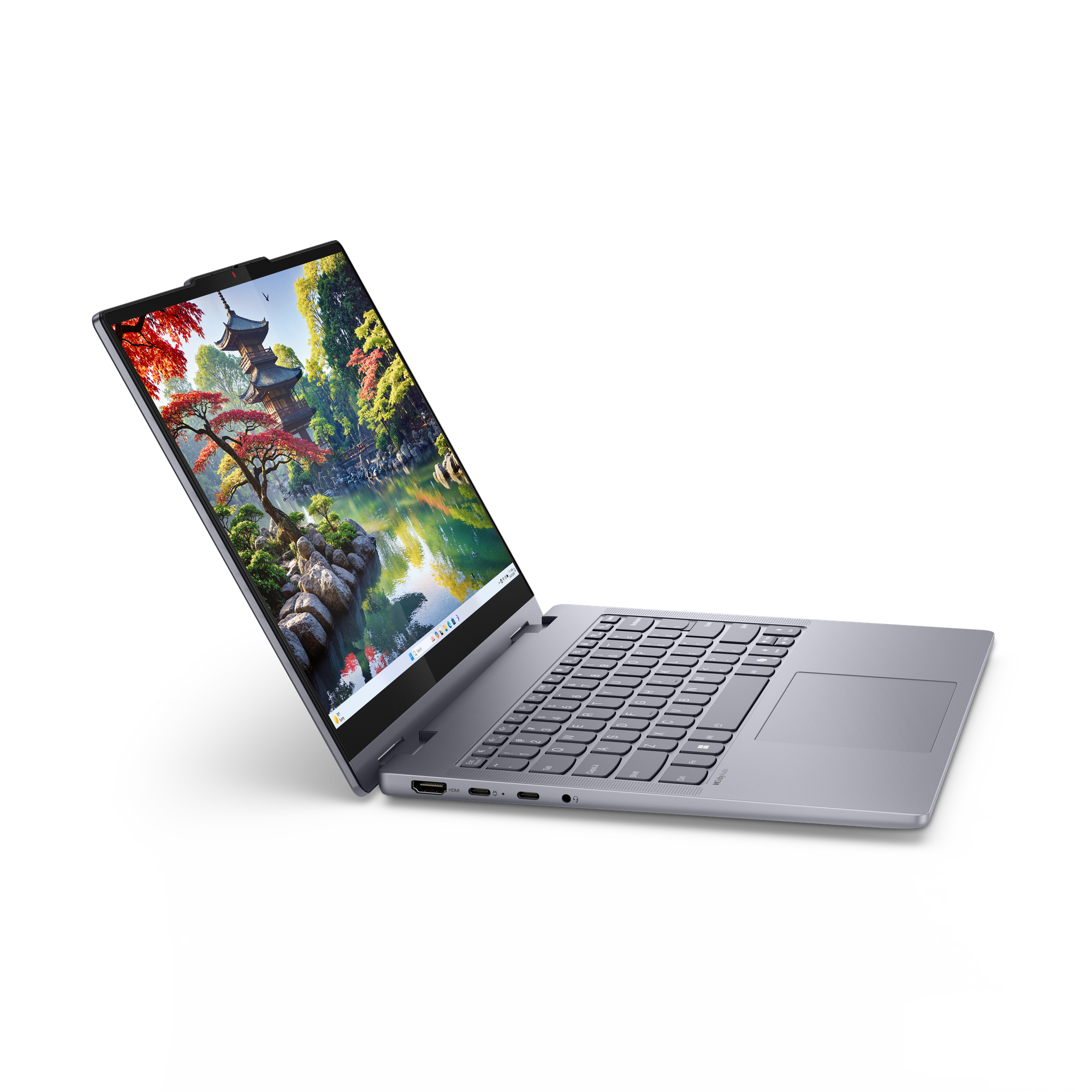 Egy nyitott laptop, amely japán kertet jelenít meg a képernyőjén.
