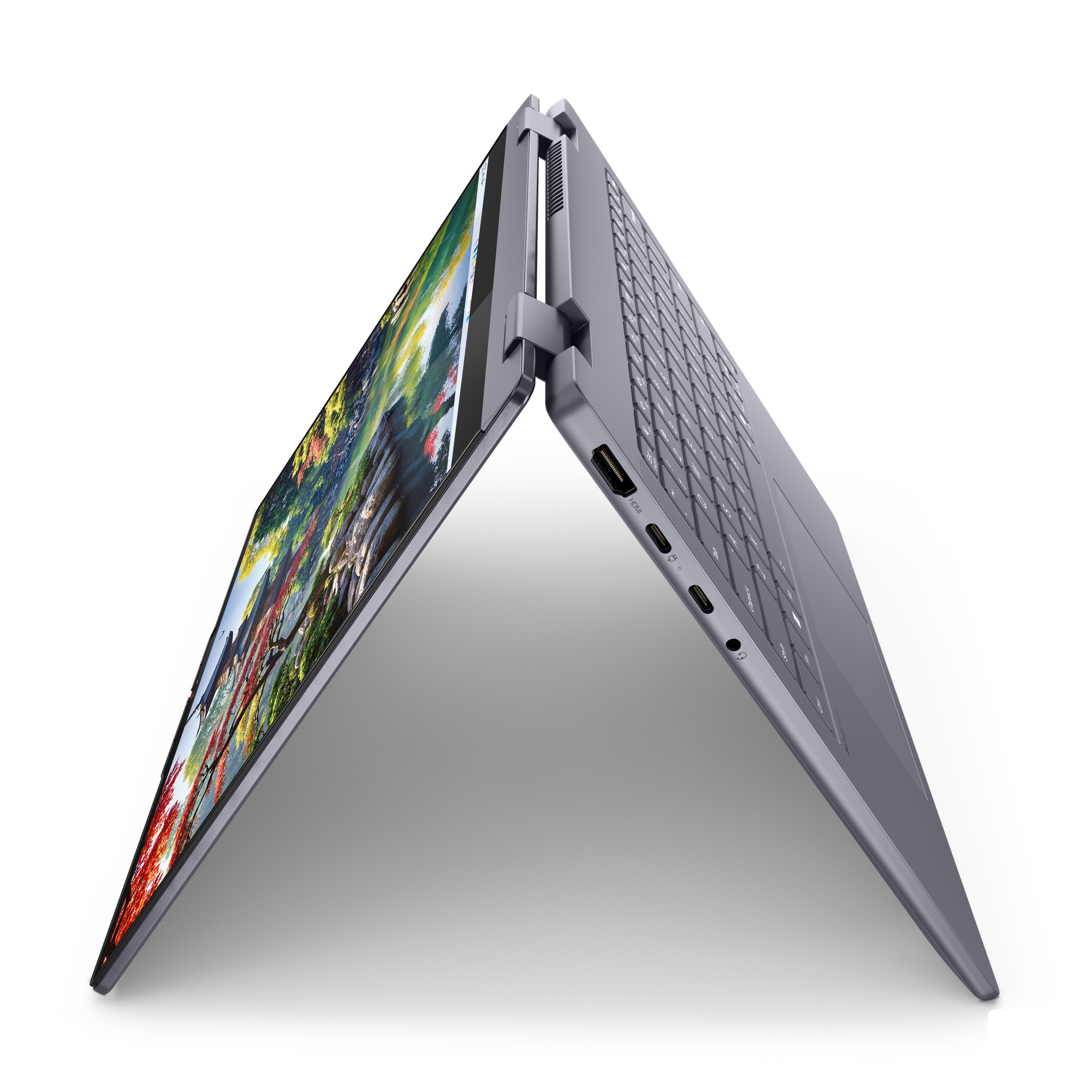 Egy szürke laptop nyitott képernyővel, színes képet jelenít meg.