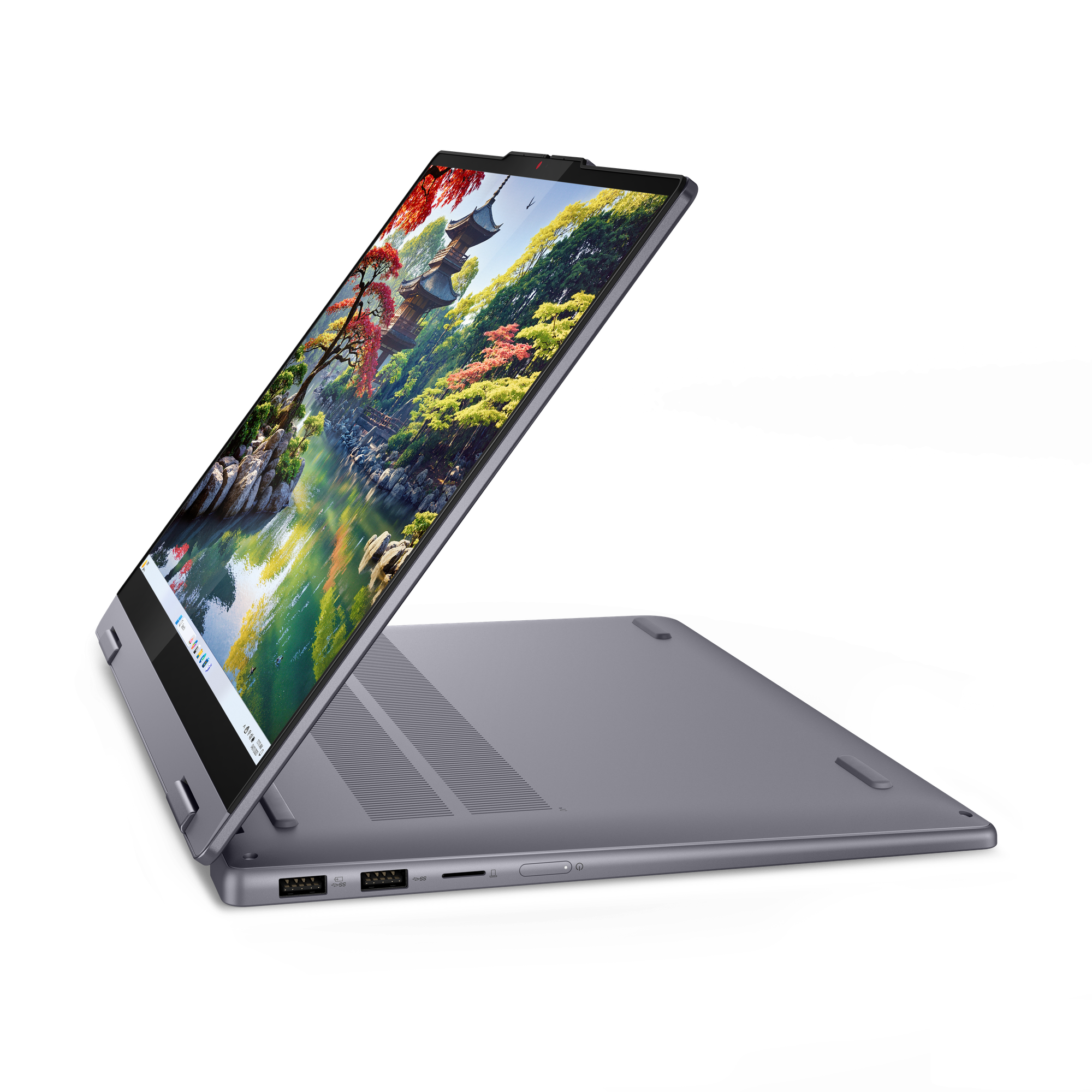 Egy szürke laptop kijelzőjén japán kert látható.