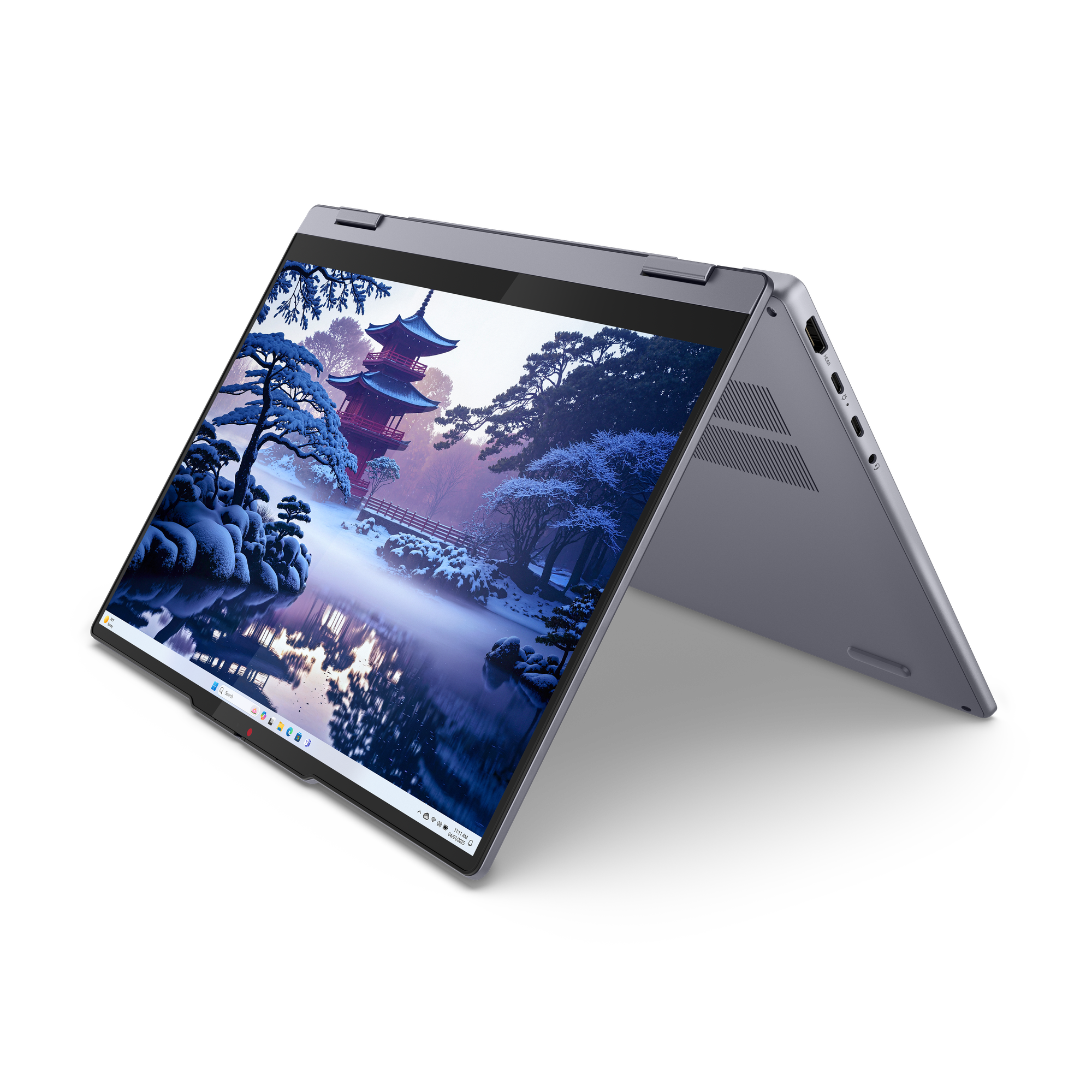 Egy laptop téli tájképet jelenít meg pagodával és hófödte fákkal egy tó mellett.
