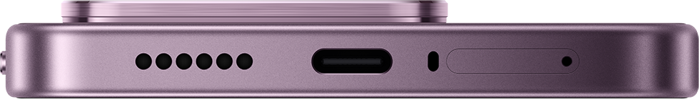 Lila telefon alsó élének közelebbi képe: USB-C port, hangszórórács, SIM tálca.