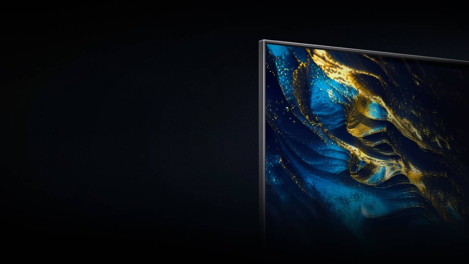 Un televisor moderno que muestra una imagen abstracta oscura en tonos azules y dorados.