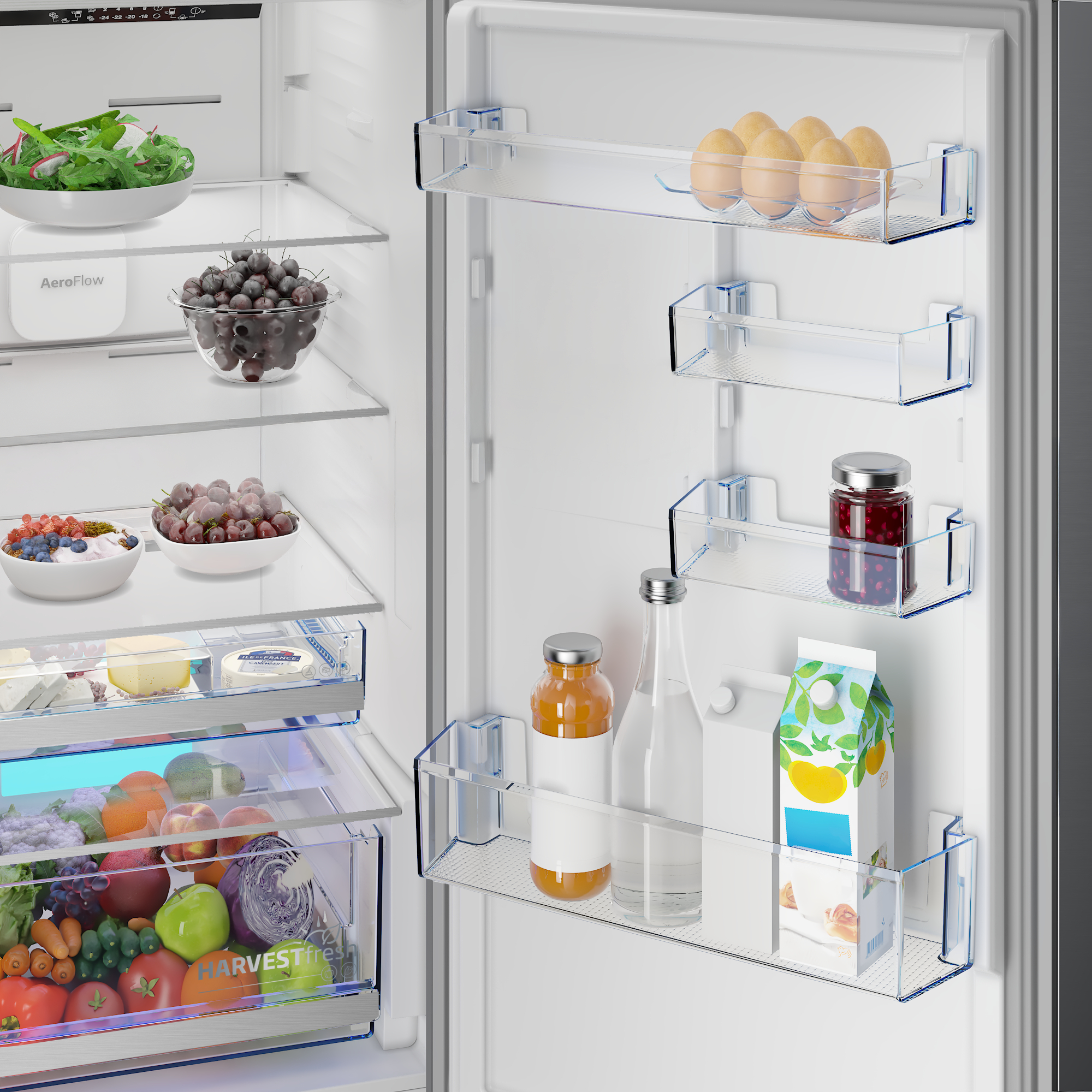 Gefrierschranktür mit Eiern, Marmelade, Saft, Milch und Obstschale.