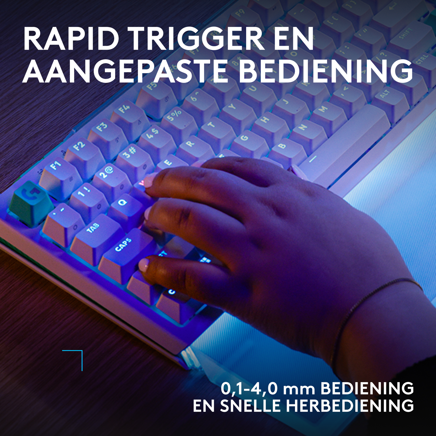 A person types on a lit keyboard with 'Rapid Trigger' text.