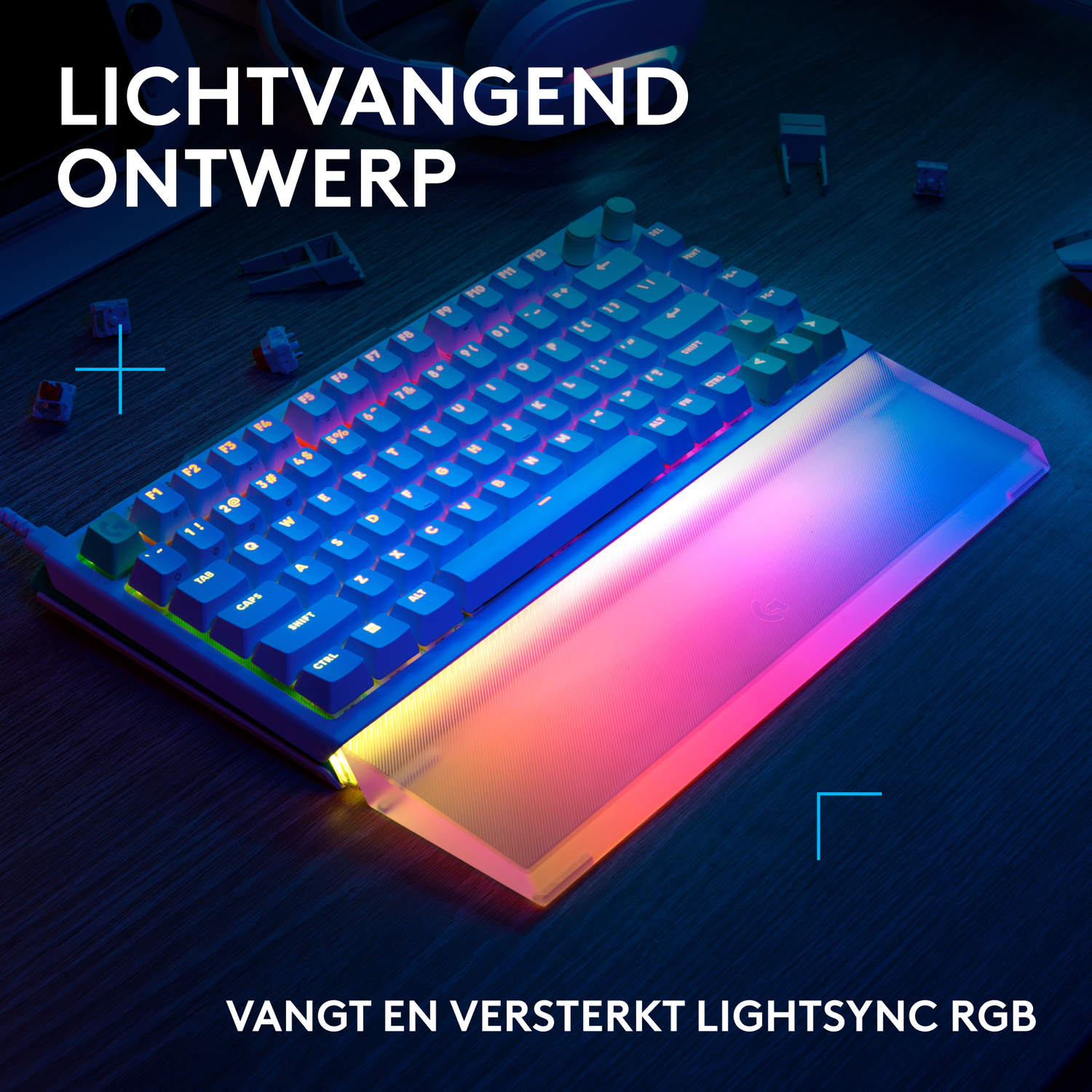 A backlit keyboard with RGB lighting effects on a wooden desk.