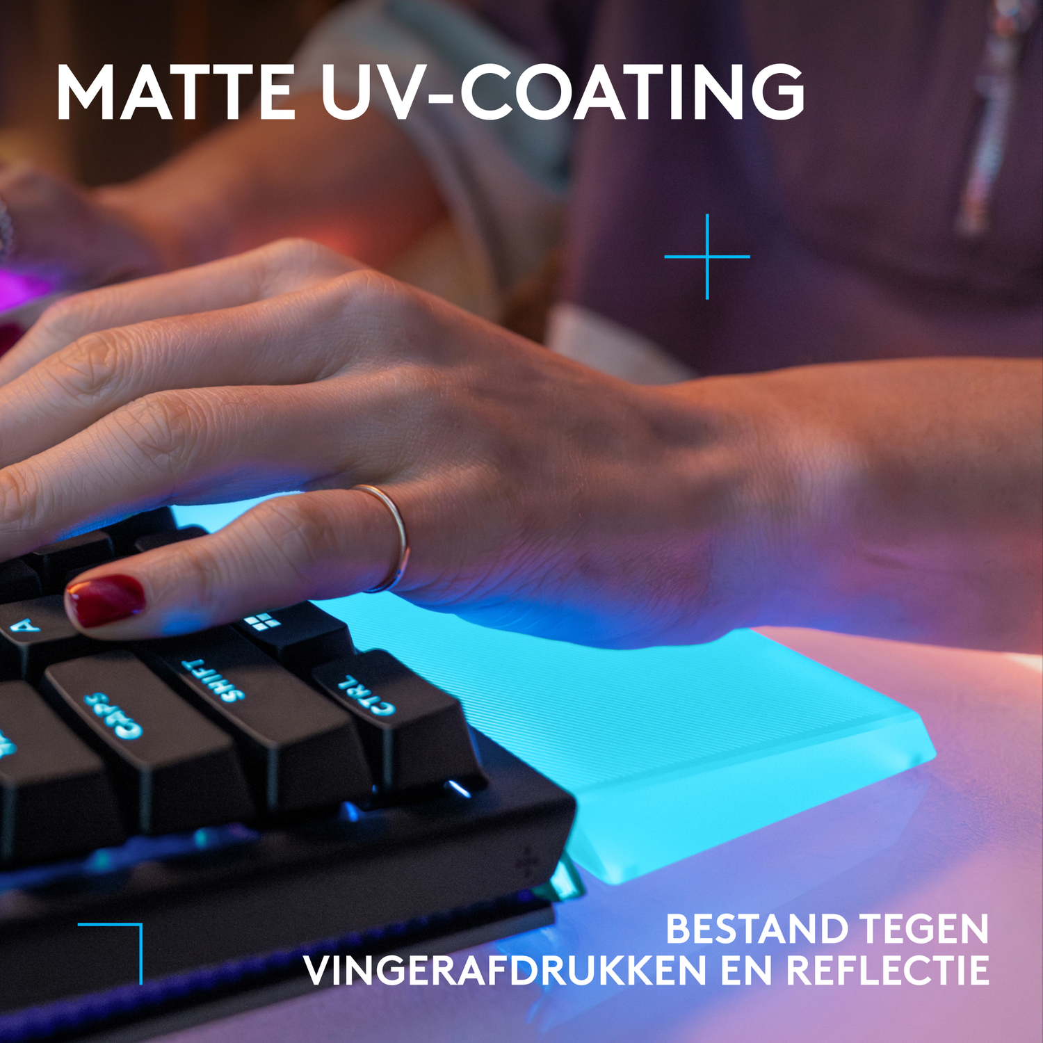 A hand types on a keyboard with blue lighting. Text: MATTE UV-COATING.