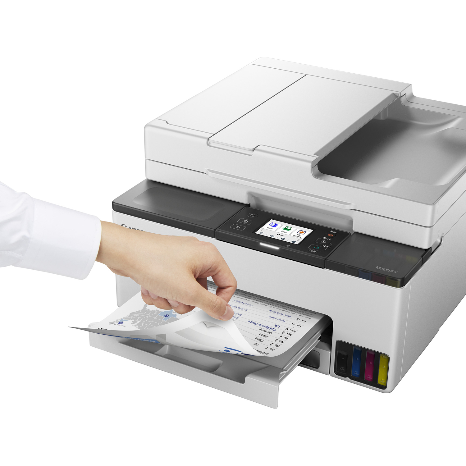 A hand inserts paper into a white Canon MAXIFY printer.