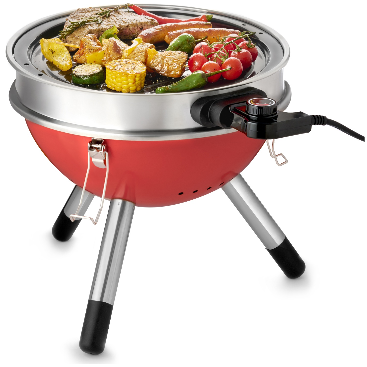 Rode elektrische grill met biefstuk, worstjes, maïs, tomaten, pepers en aardappelen.