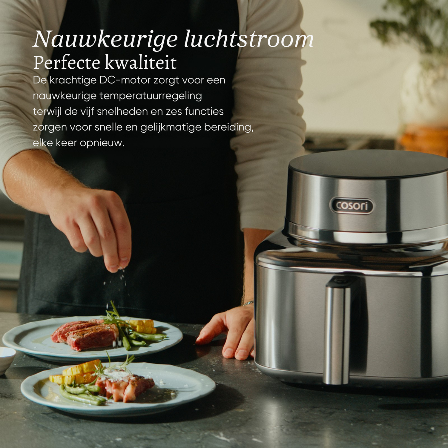 Man seasons meat on plates next to a silver appliance. Precise airflow quality.
