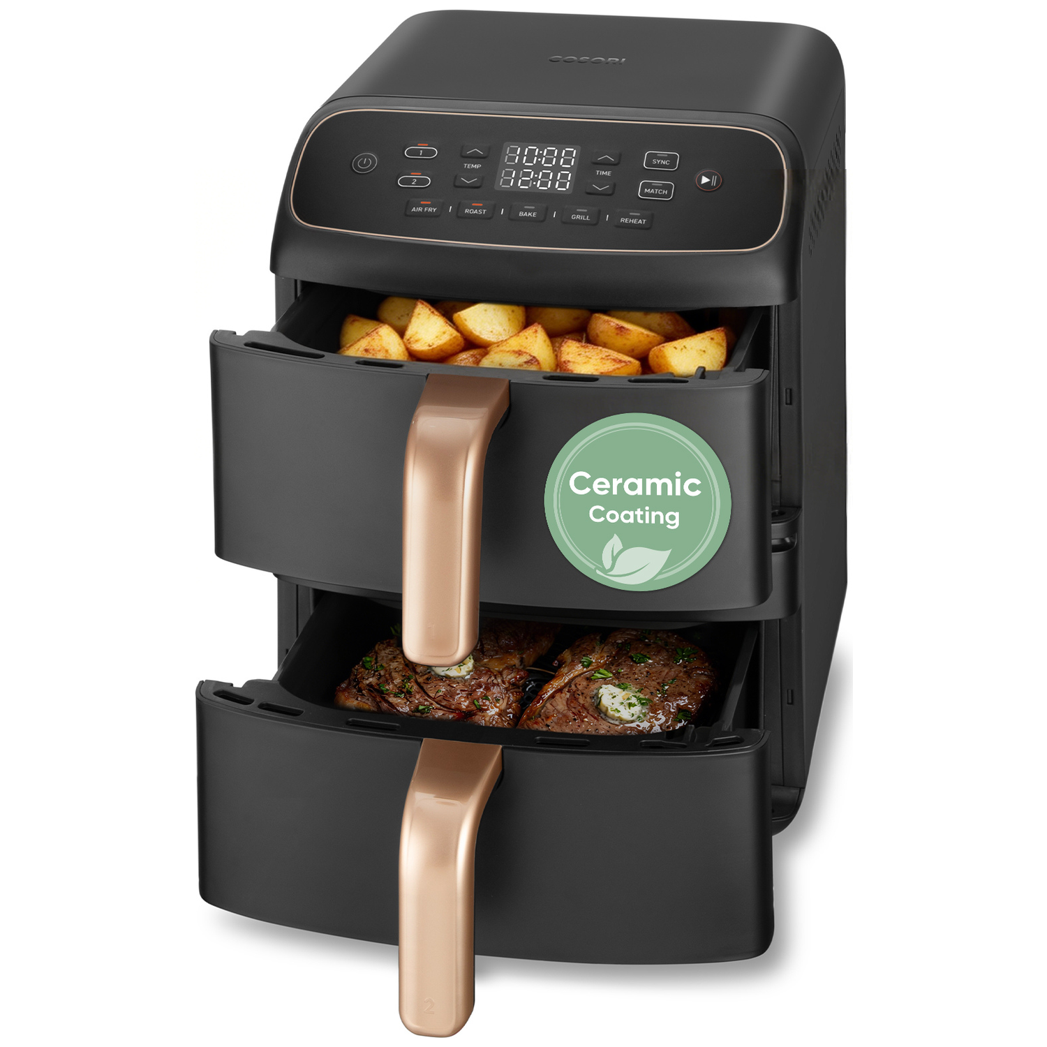 Een zwarte heteluchtfriteuse met dubbele mand, boven frietjes en onder steaks.