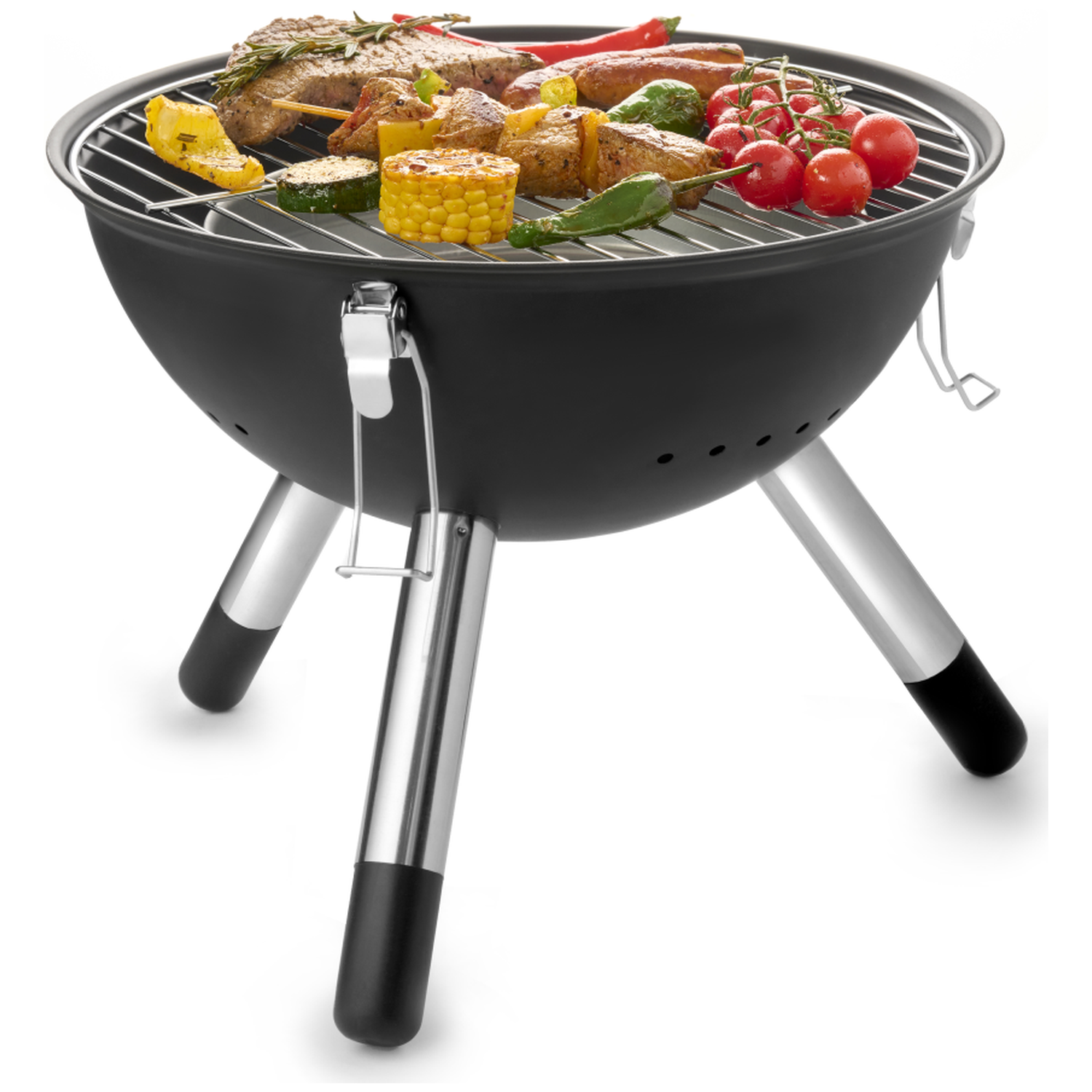 Black grill with meat, corn on the cob, tomatoes, and zucchini on the grate.