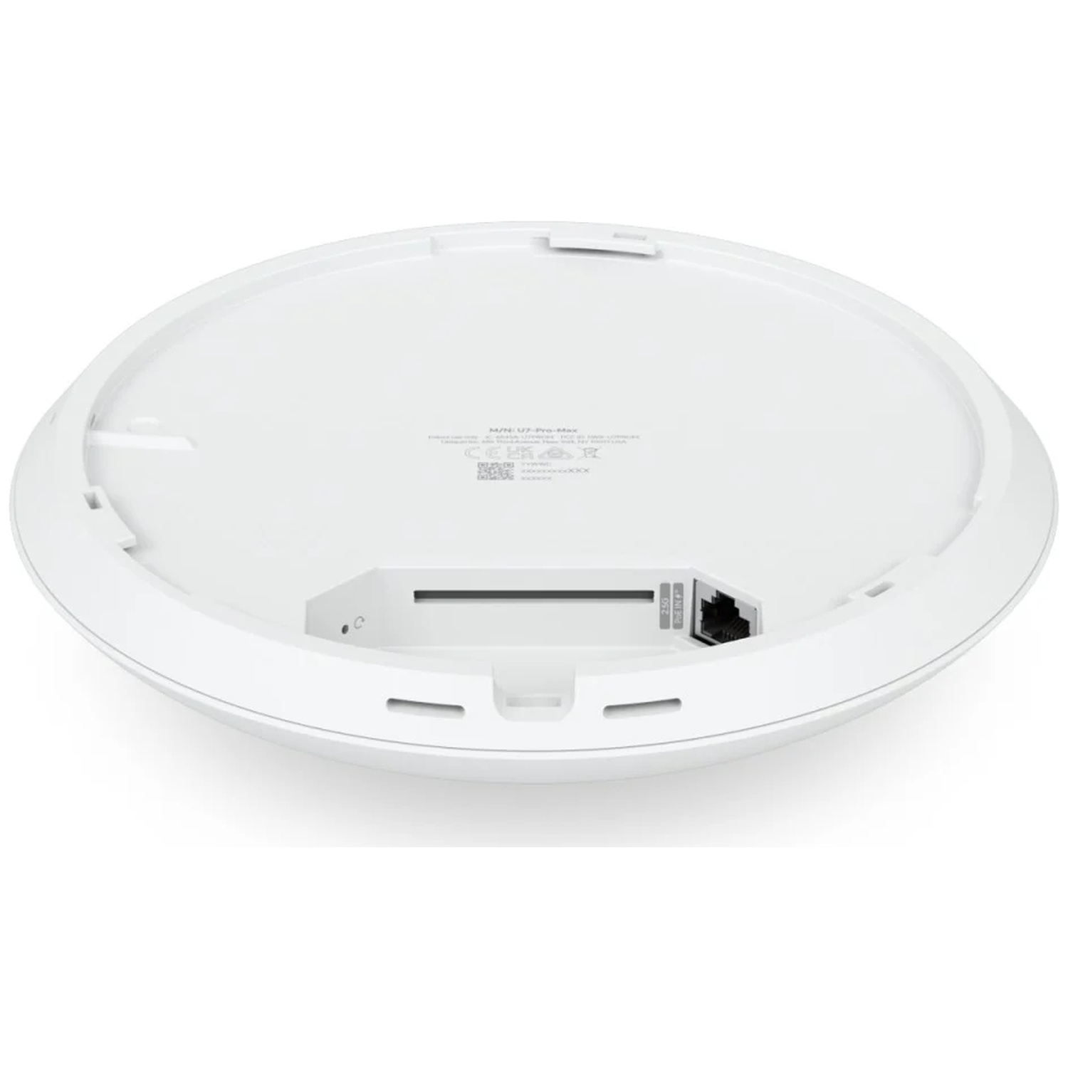 Underside of a white, round Wi-Fi device showing ports and labels.