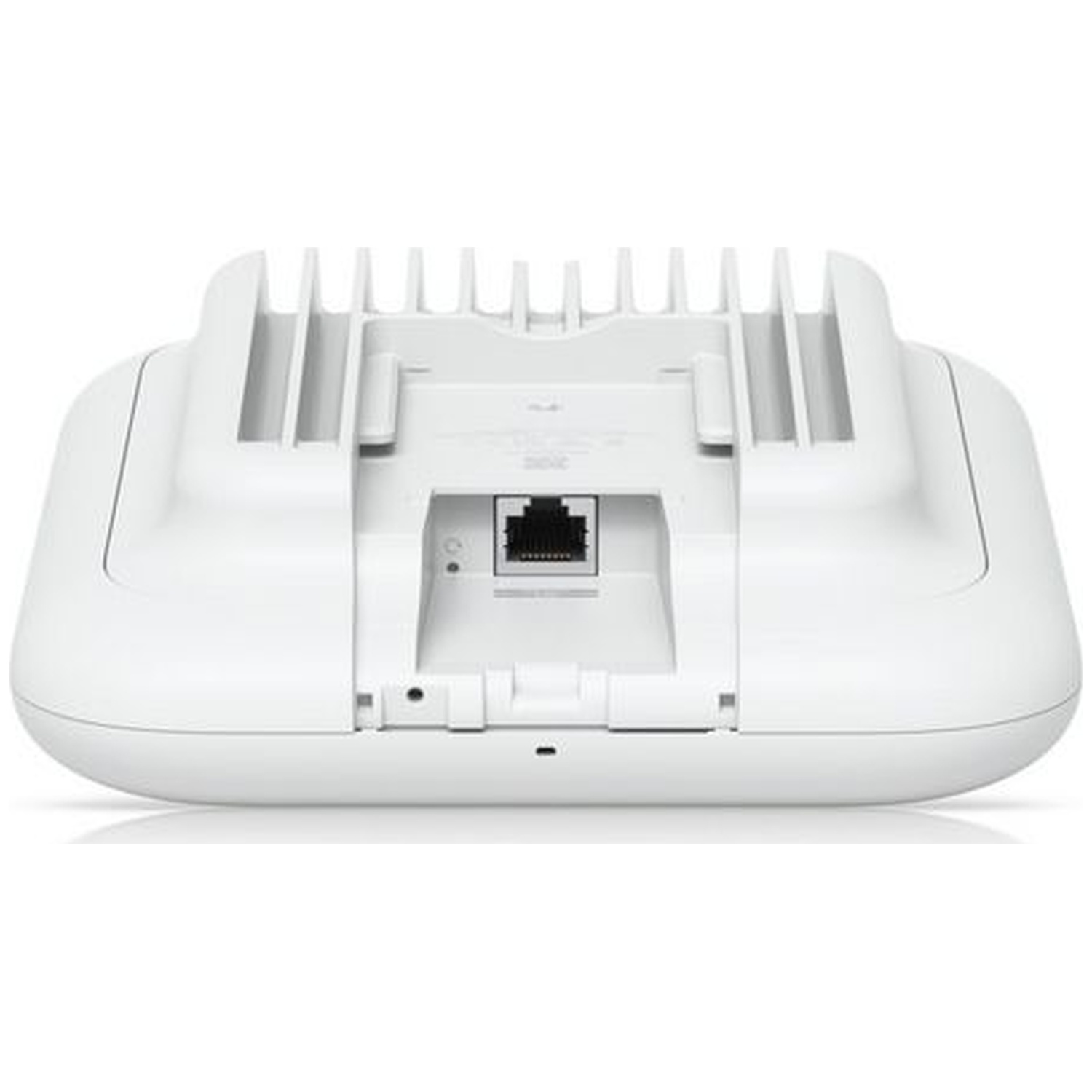 A white network device with an Ethernet port and cooling fins.