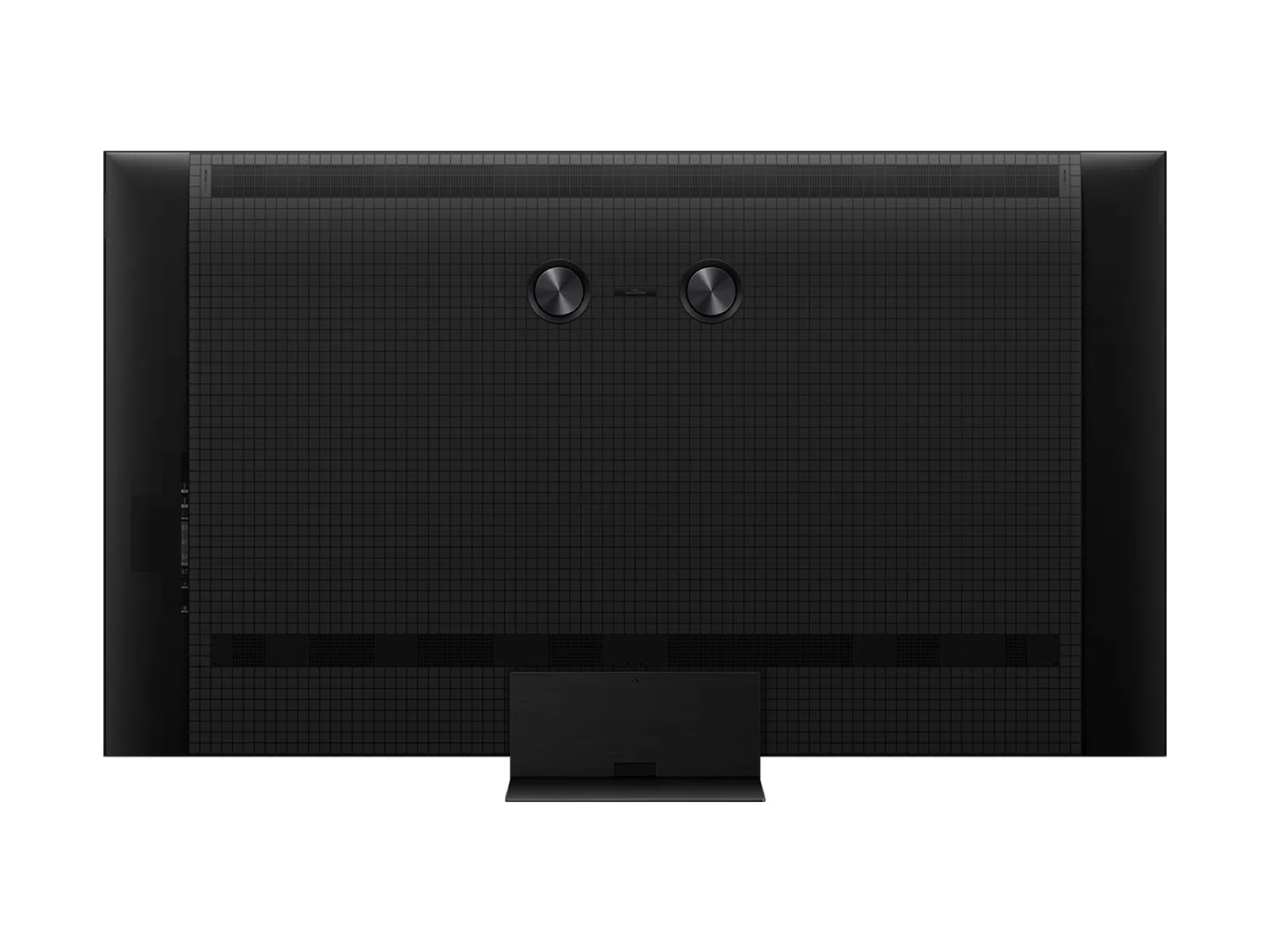 Parte trasera de un televisor negro con patrón de rejilla y dos botones circulares.