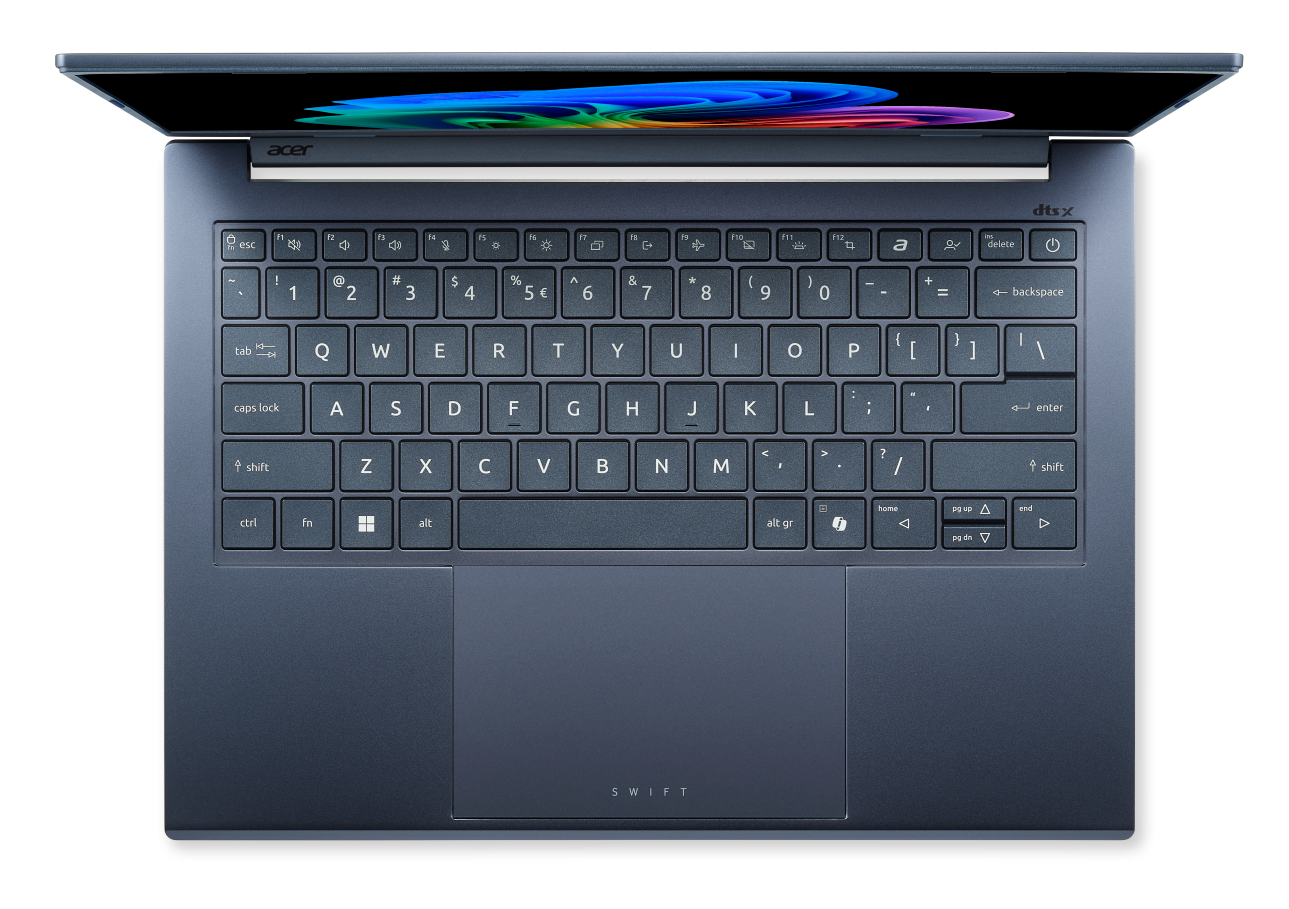 Ciemnoniebieski laptop Acer z podświetlaną klawiaturą i otwartym ekranem.