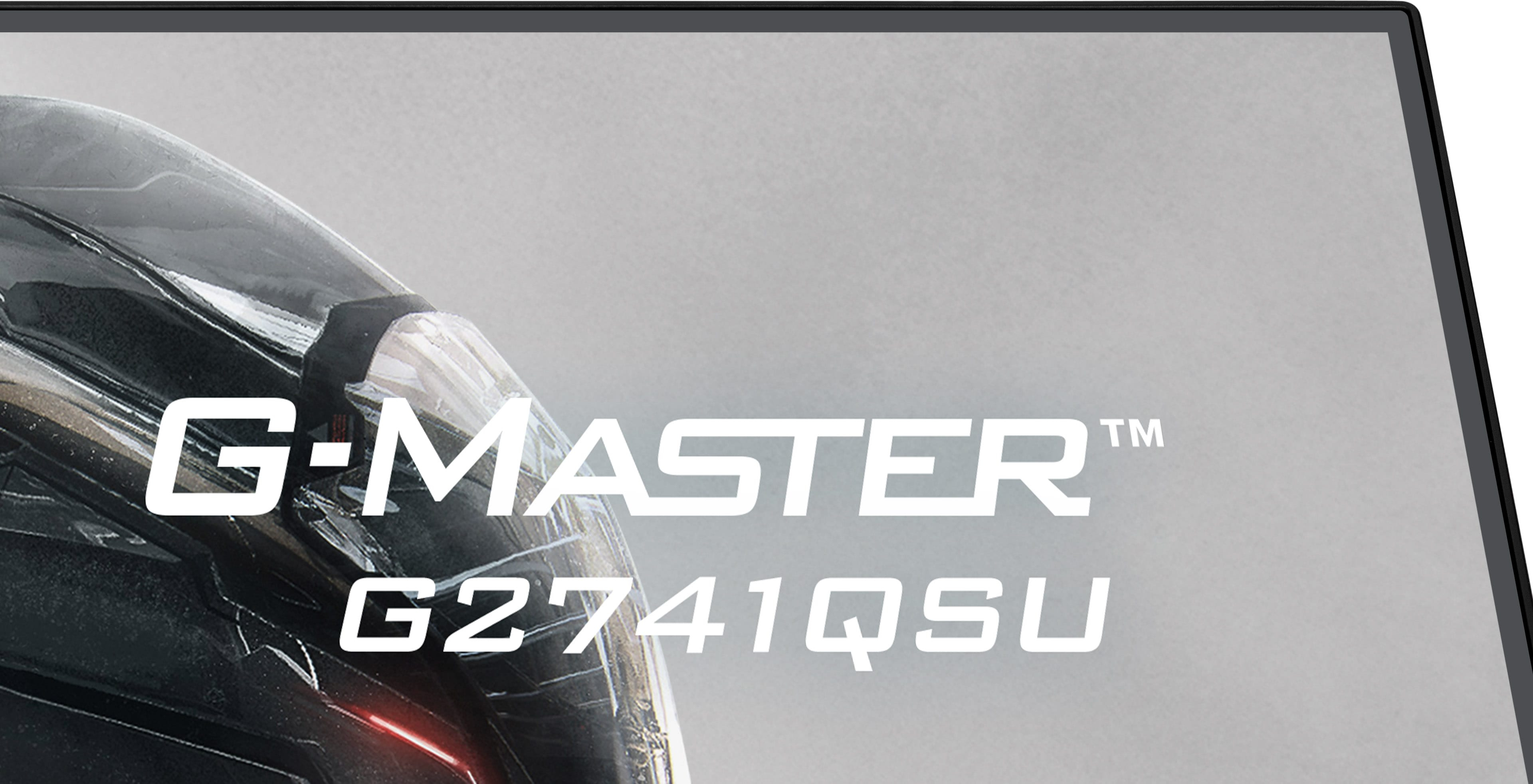 Zbliżenie czarnego monitora z białym napisem 'G-MASTER G2741QSU'.