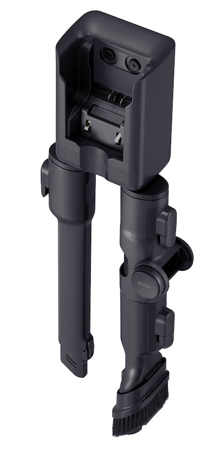 Ciemnoszary adapter odkurzacza z głowicą szczotkową i stykami ładowania.