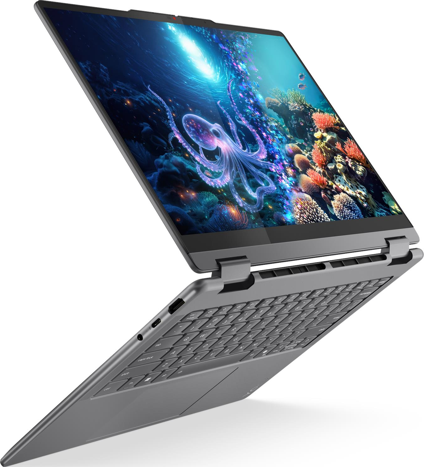 Ein graues Laptop mit einem Bildschirm, der einen leuchtenden Oktopus im Meer zeigt.