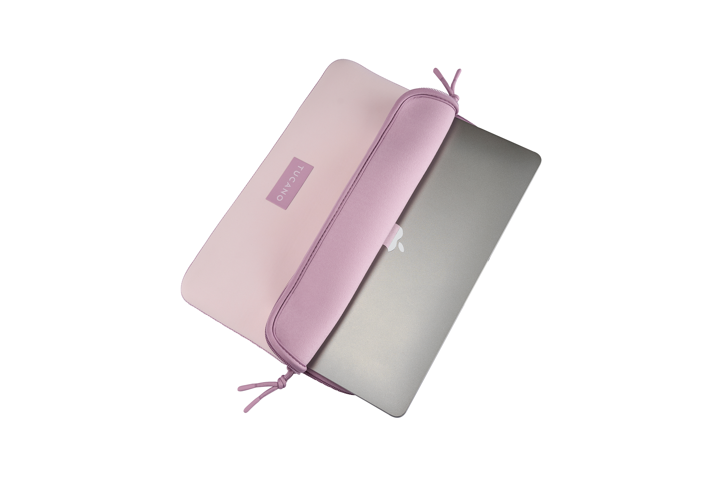 Ein pinker Laptop-Schutz mit einem silbernen Laptop darin.