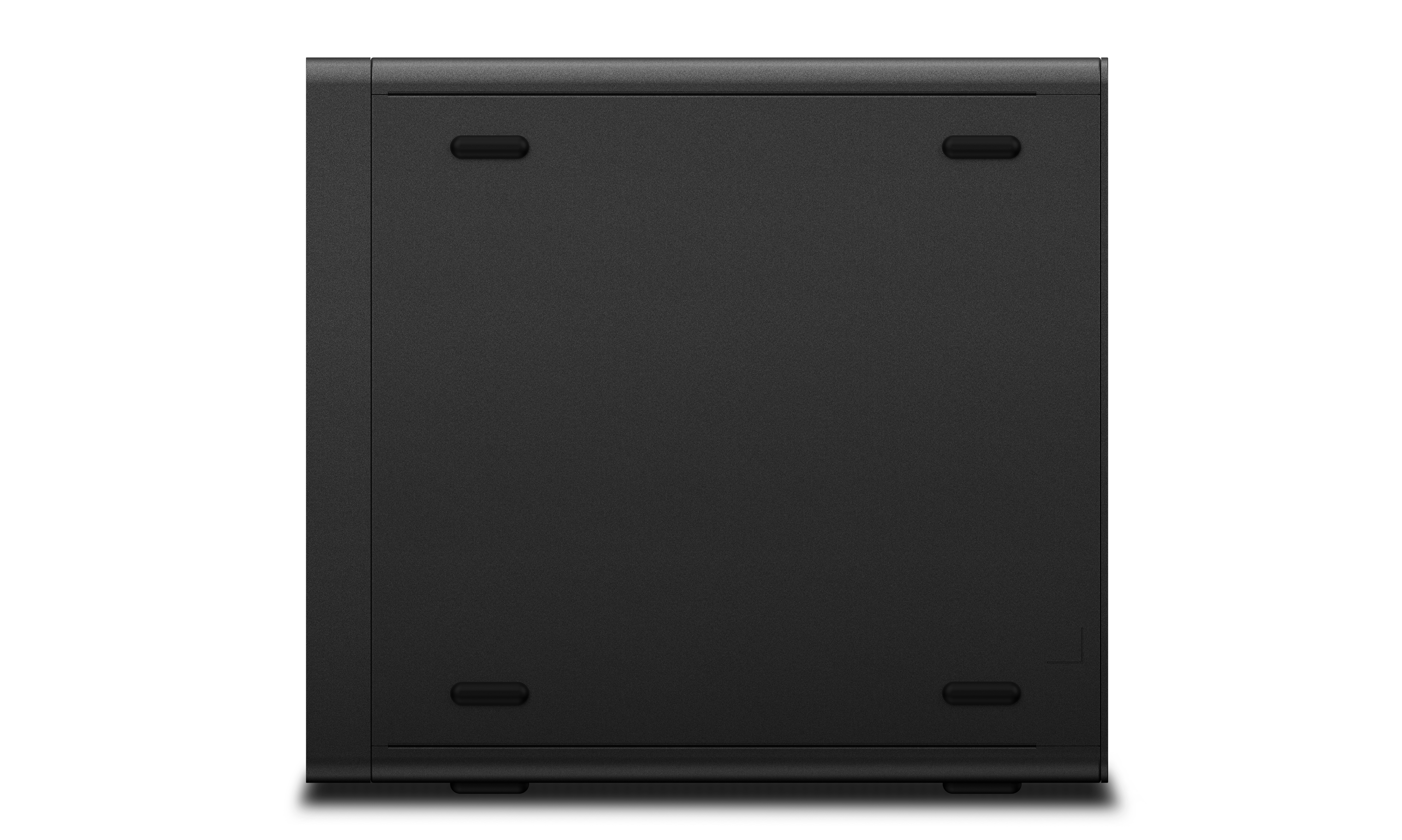 Unterseite eines schwarzen Computers mit vier ovalen Gummifüßen.