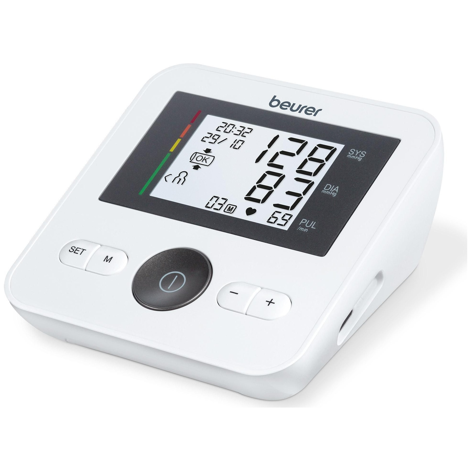 A white Beurer upper arm blood pressure monitor with a digital display shows 128/83.