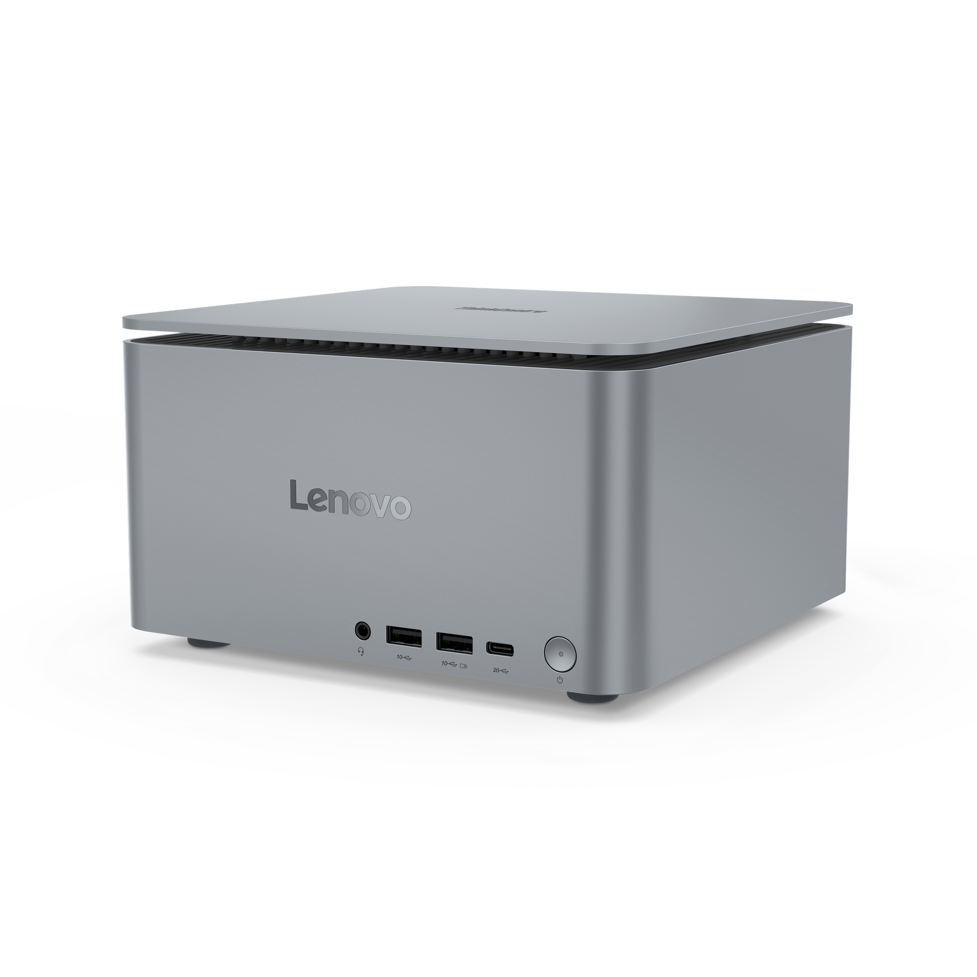Ein silberner Lenovo Mini-PC mit Anschlüssen und Netzschalter auf der Vorderseite.