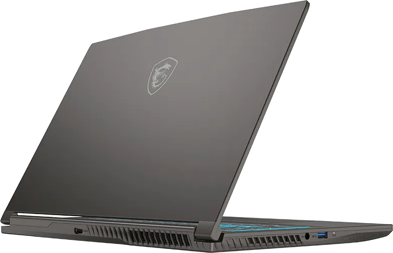 Egy zárt szürke laptop világító MSI sárkány logóval a fedelén.