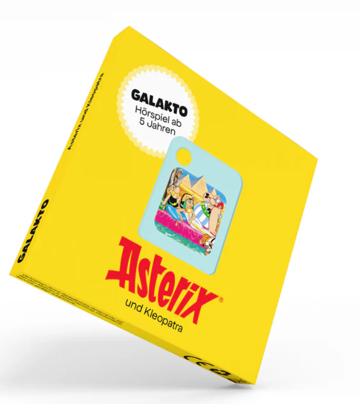 Gelbe Asterix-Verpackung mit Comic-Bild und Text 'GALAKTO Hörspiel ab 5 Jahren'.